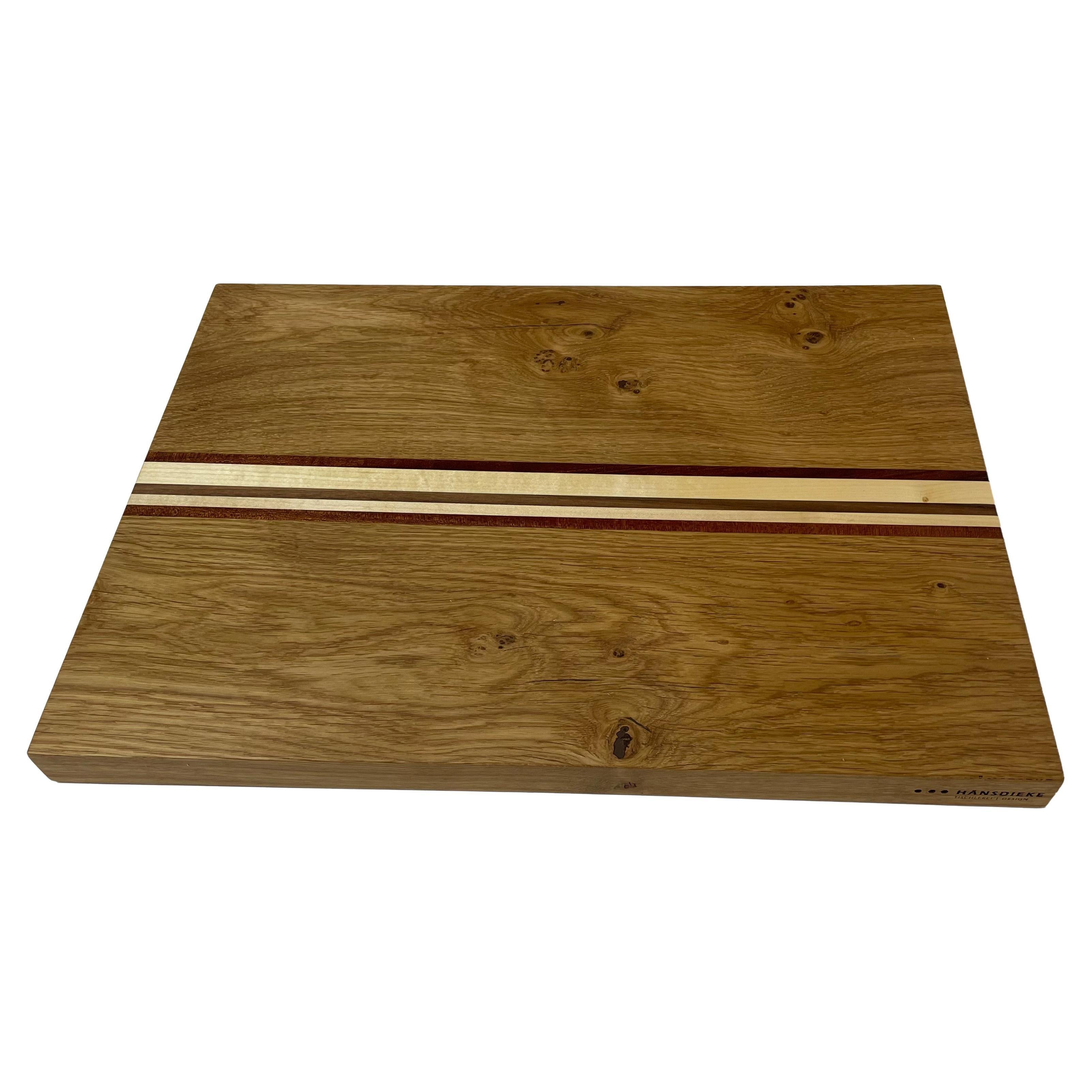 Oak cutting board with embedded wooden sticks