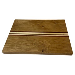 Antique Oak cutting board with embedded wooden sticks