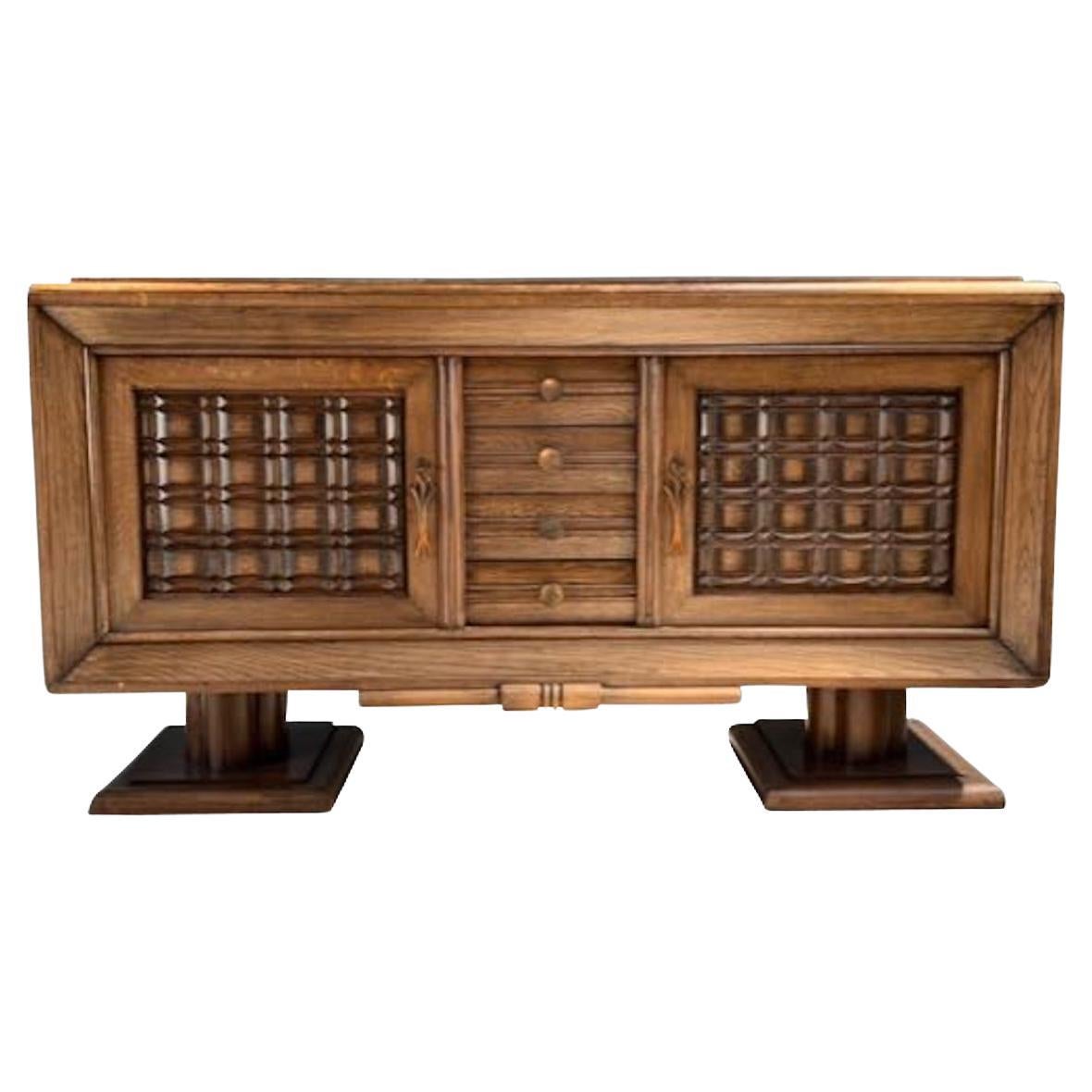 Oak Decoratively Carved Facade Two Door Credenza, France, Mid Century For Sale