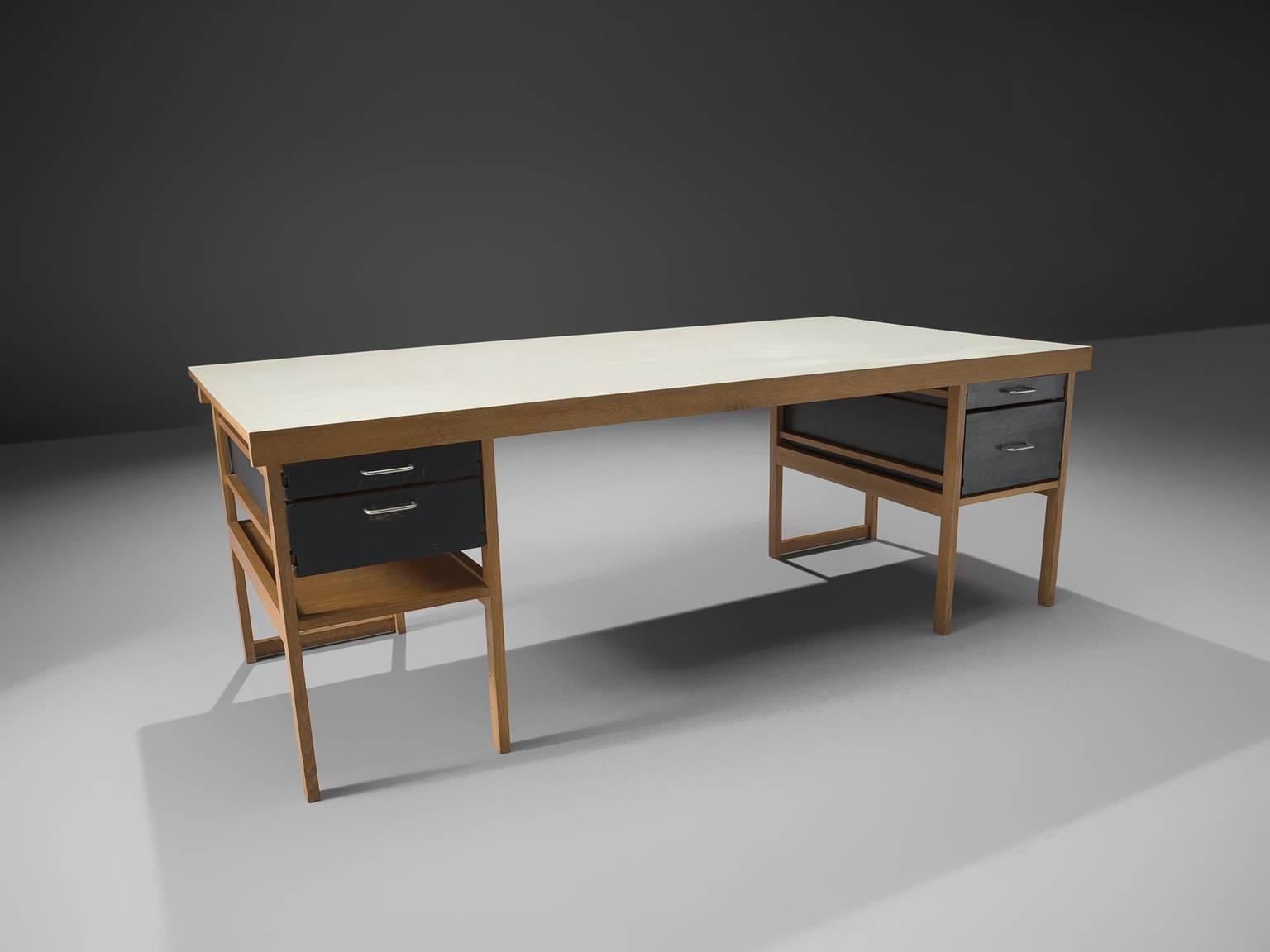 Desk Benedikt Rohner for Oswald, 1965

This desk in natural and lacquered oak is designed by the Swiss designer Benedikt Rohner for Oswald, 1965. The most interesting thing about this desk is perhaps its open construction. Nothing is hidden, all