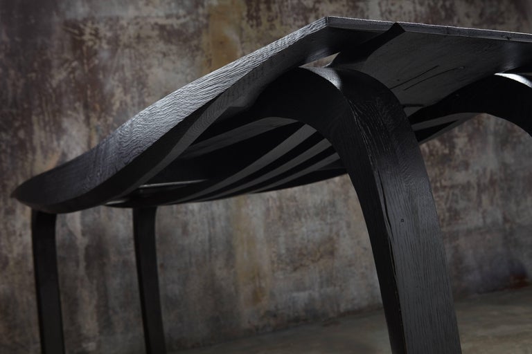 Contemporary curved leg oak desk. ebonized, textured finish. In stock