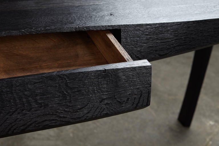 Contemporary curved leg oak desk. ebonized, textured finish. In stock