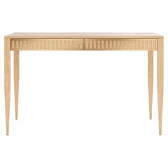 Oak desk with two drawers with brass fronts in mid century modern style