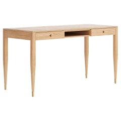Oak desk with two solid drawers and shelf in mid century modern style