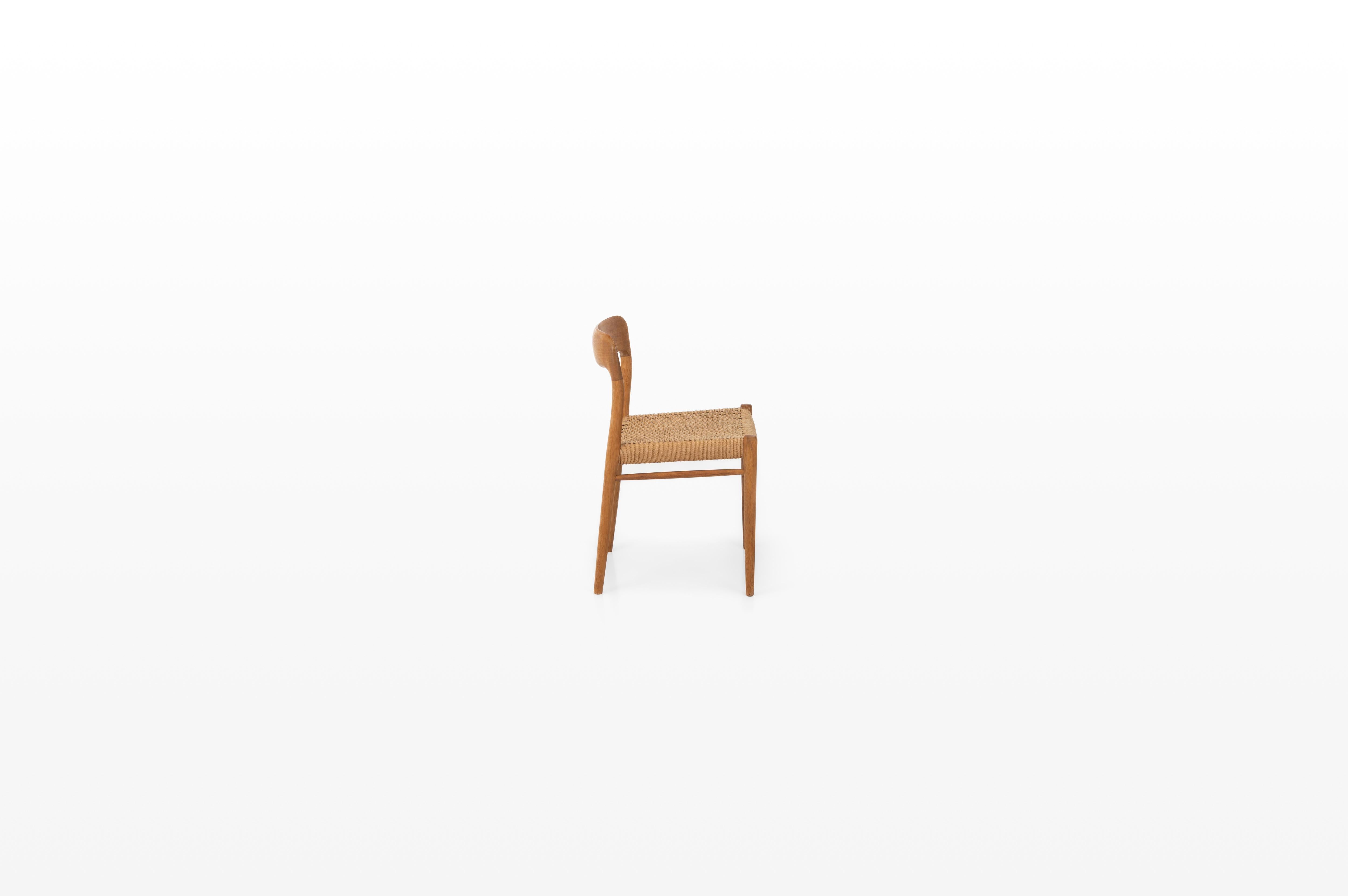 Scandinavian Modern Oak dining chair and papercord by Niels Otto Møller for J.L. Møllers Møbelfabrik