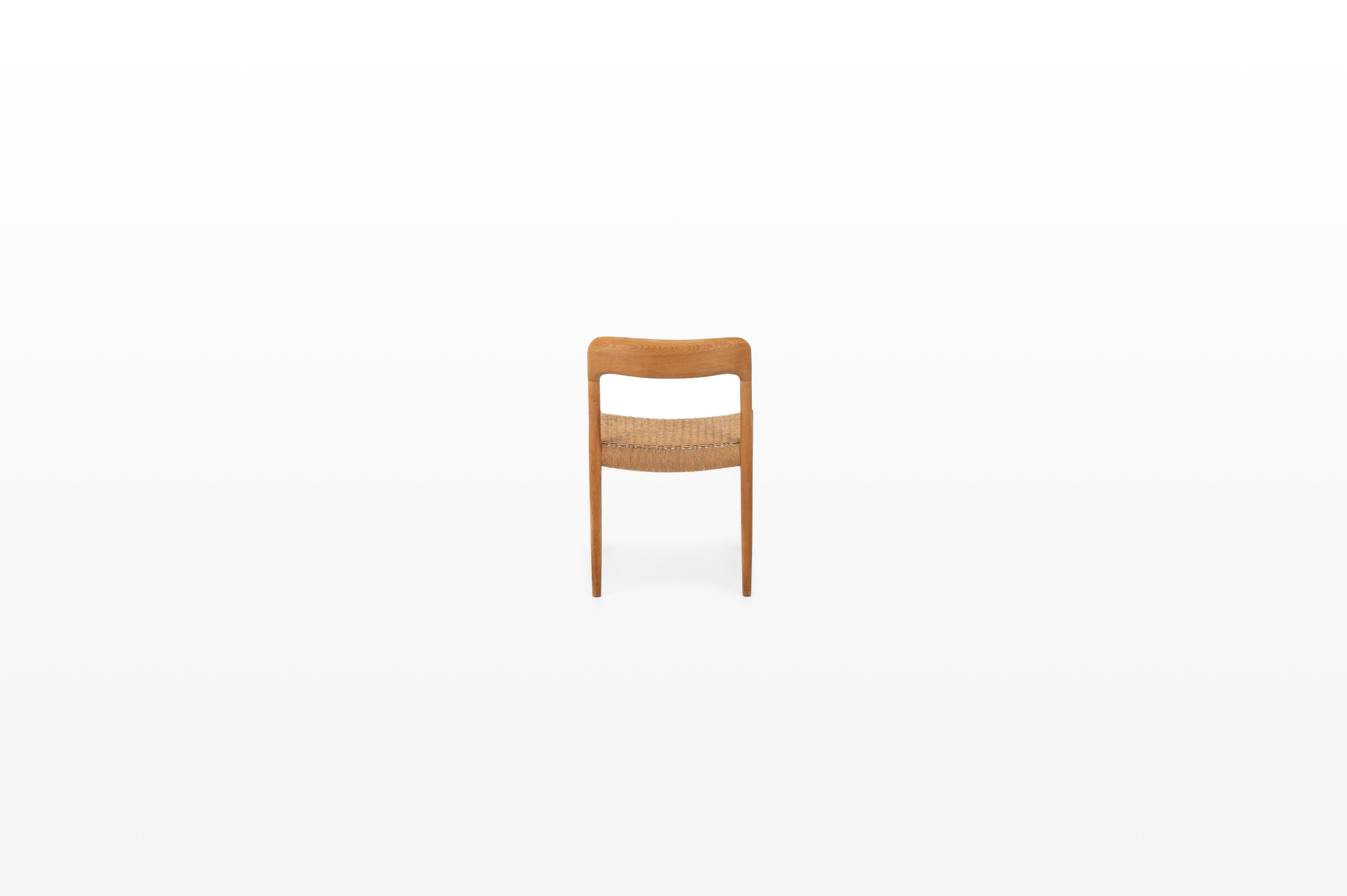 Danish Oak dining chair and papercord by Niels Otto Møller for J.L. Møllers Møbelfabrik
