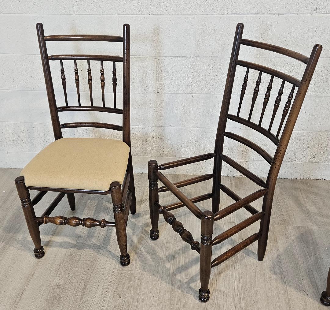 Oak spindle back Dining Chairs Traditional English Tudor Style, set of six without arms.
We have on offer here a sturdy set of English dining chairs without arms in a slightly distressed finish but not distressed by use. They have a lovely color and