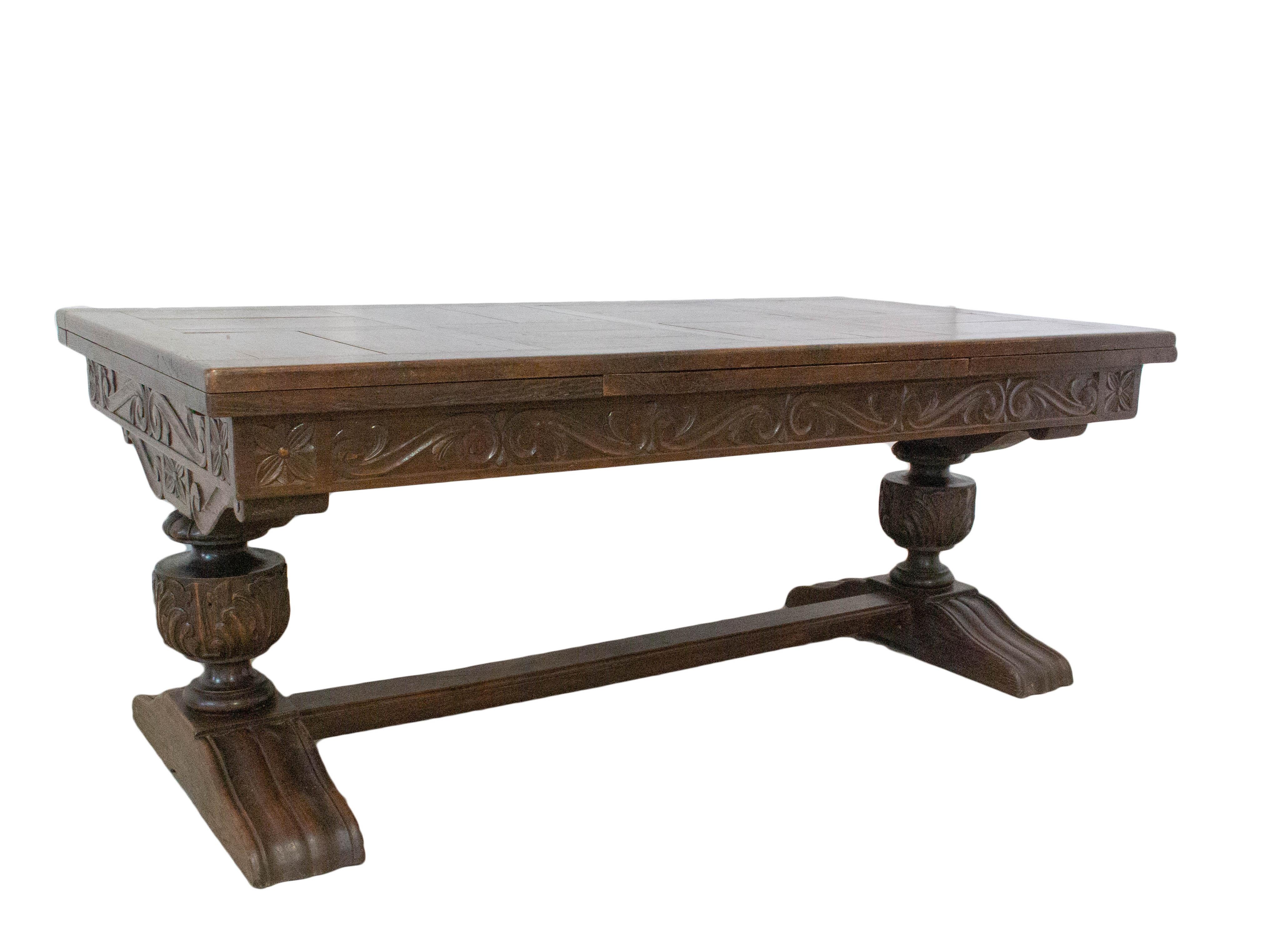 French Spanish Basque Renaissance Revival dining table extending 20th century
Carved oak solid wood.
This table will seat 12 people when extended fully open with both leaves, smooth mechanism.
Table closed measures 180 cm with both leaves open