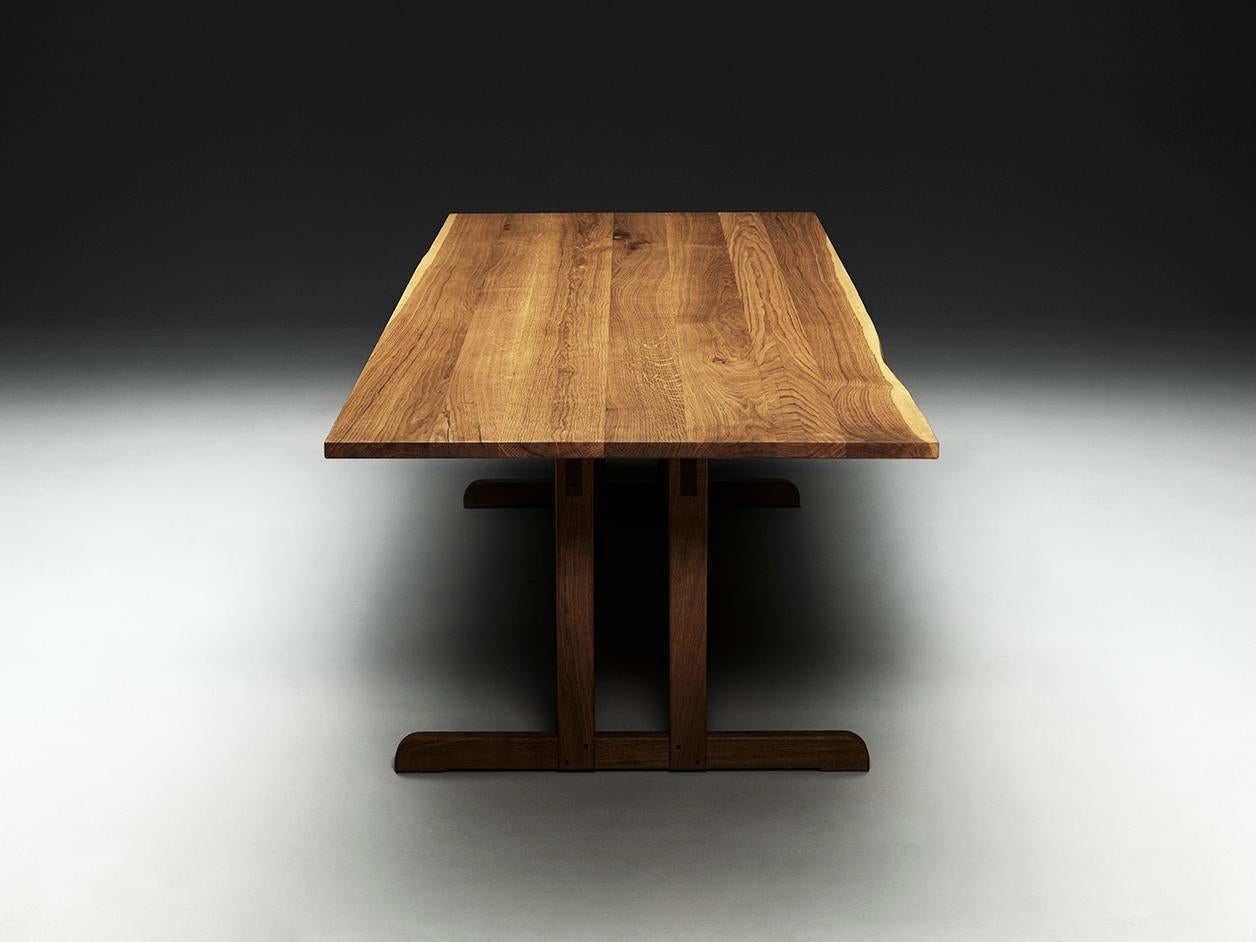 
The Oak Dining Table 

A take on the classic dining table in massive wood. The Dining Table in Oak is constructed entirely without bolts, with a design that embraces the imperfections of the material - selected branches are kept visible and rough