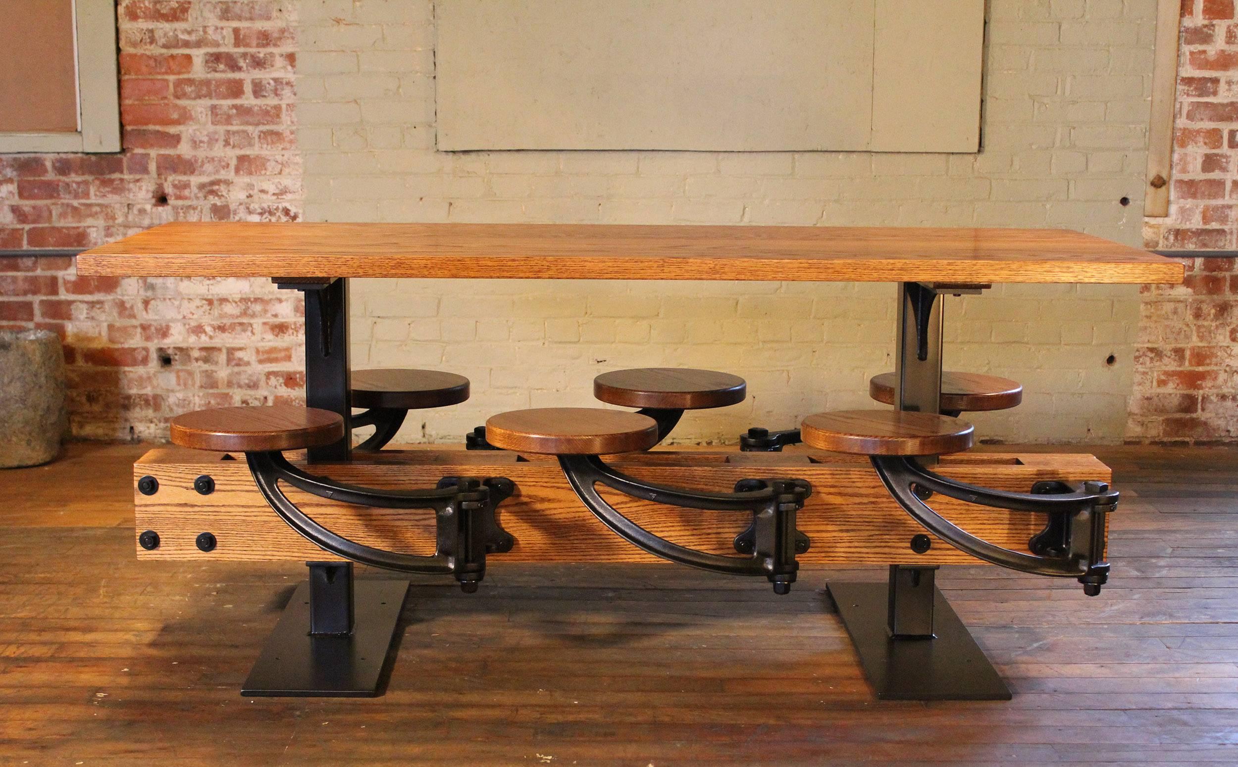 Industrial Oak Dining Table with Attached Swing-Out Seats For Sale