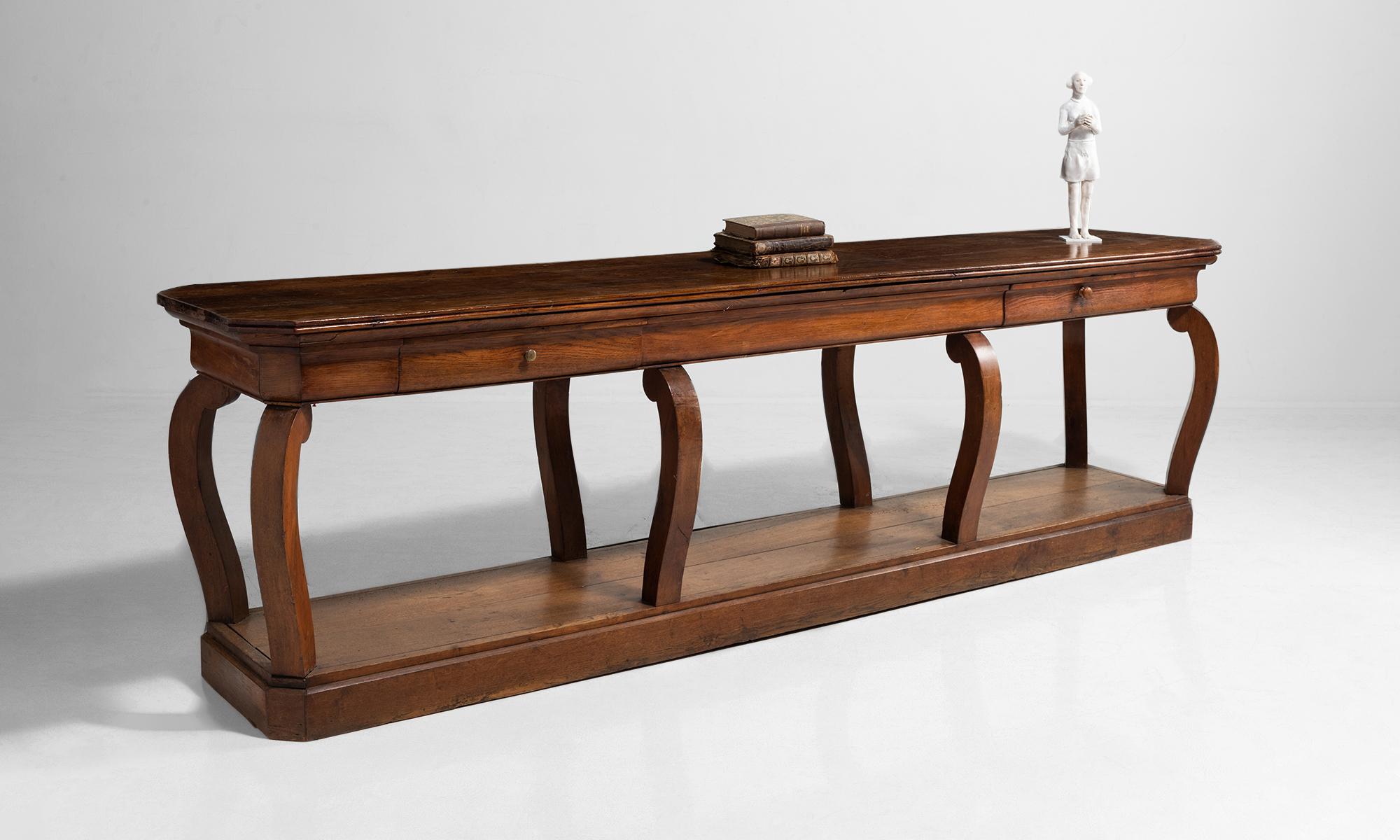 Oak drapers table, France, circa 1880.

Elegant drapers table with eight bowed legs in period finish.
  
