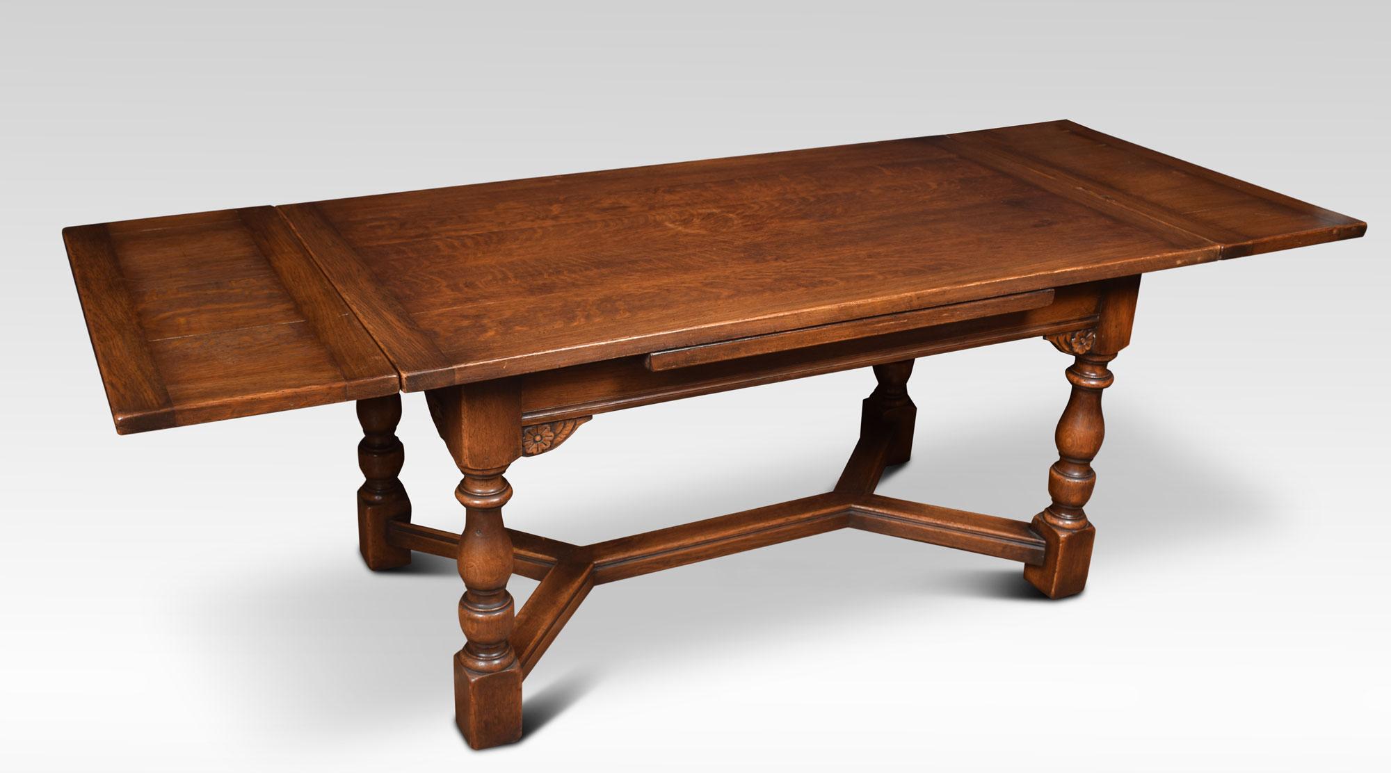 Oak draw leaf refectory table, the rectangular solid oak top above two pull out ends, Raised up on turned tapering legs joined by a double Y-shaped stretcher.
Dimensions
Height 30 inches
Width 60 inches when open 90 inches
Depth 33 inches.