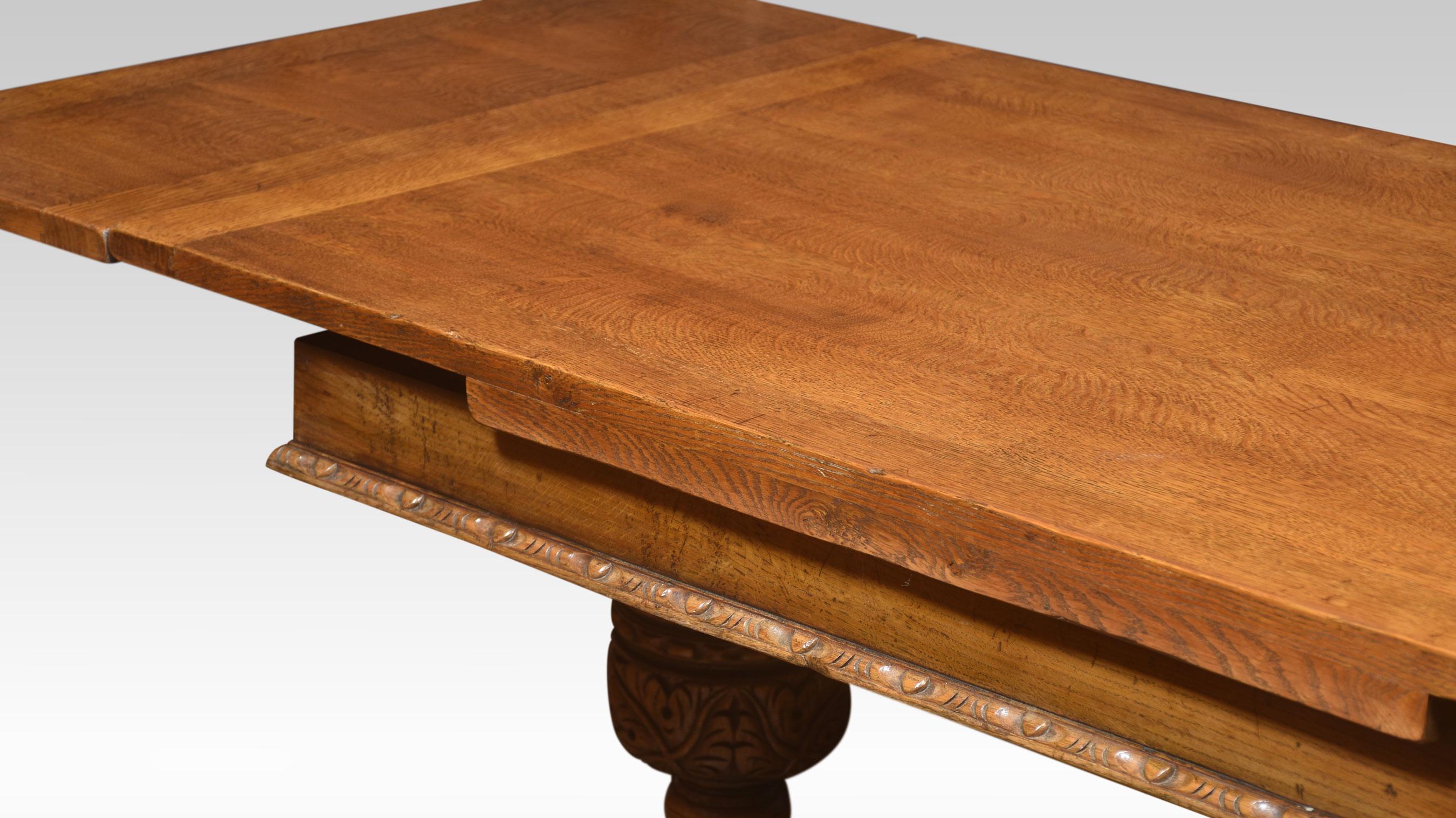 Oak draw leaf refectory table, the rectangular solid oak top having pull out ends. Above carved bulbous cup and cover supports united by a stretcher.
Dimensions
Height 30.5 Inches
Width 60 Inches when open 90 Inches
Depth 36 Inches.