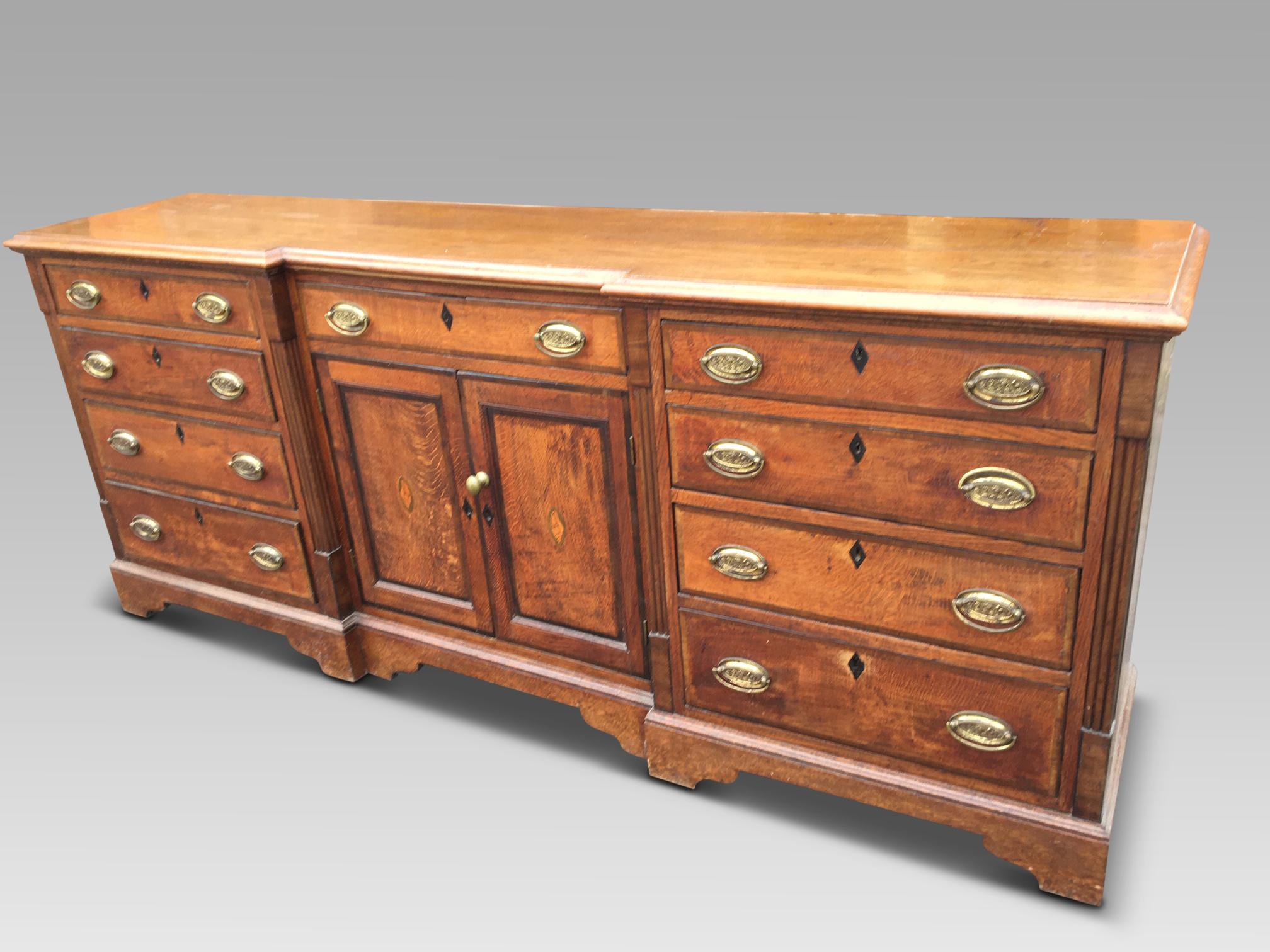 Large English oak dresser base, dating from the early 1800s
This delightful antique dresser has been well maintained by former owners and is shown herewith a great color and rich antique patination. This dresser has 9 smoothly running drawers and a