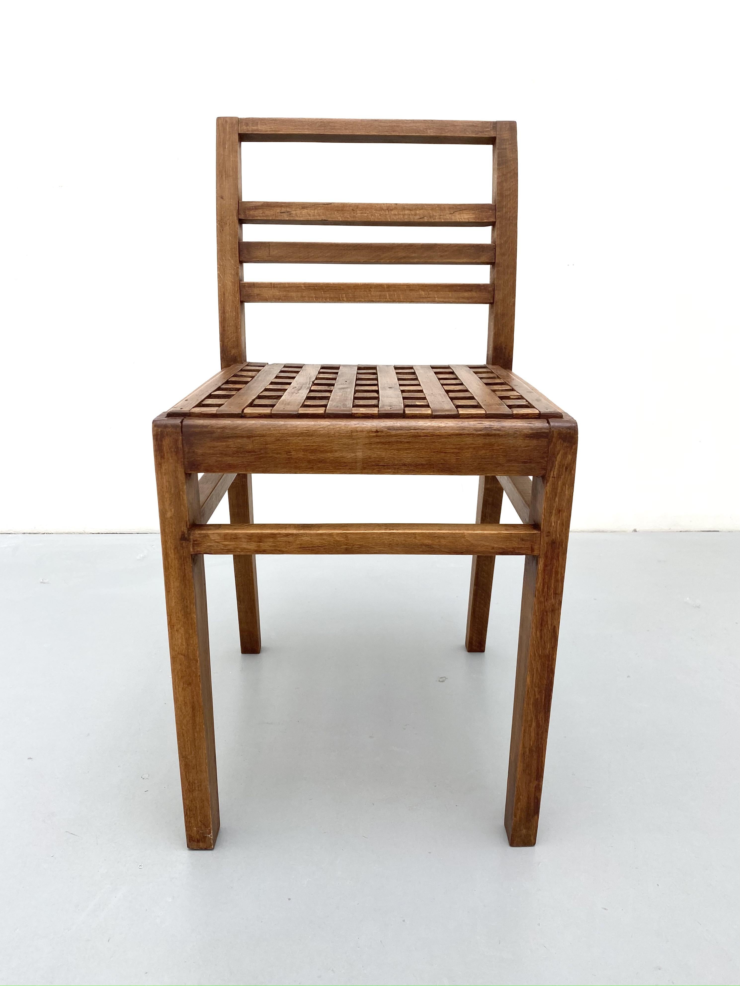 Oak duckboard chair model 103 by René Gabriel, 1941

Chair by René Gabriel designed in 1941 for the provisional construction department. This was the first emergency furniture for victims of the Second World War bombings. This chair is part of