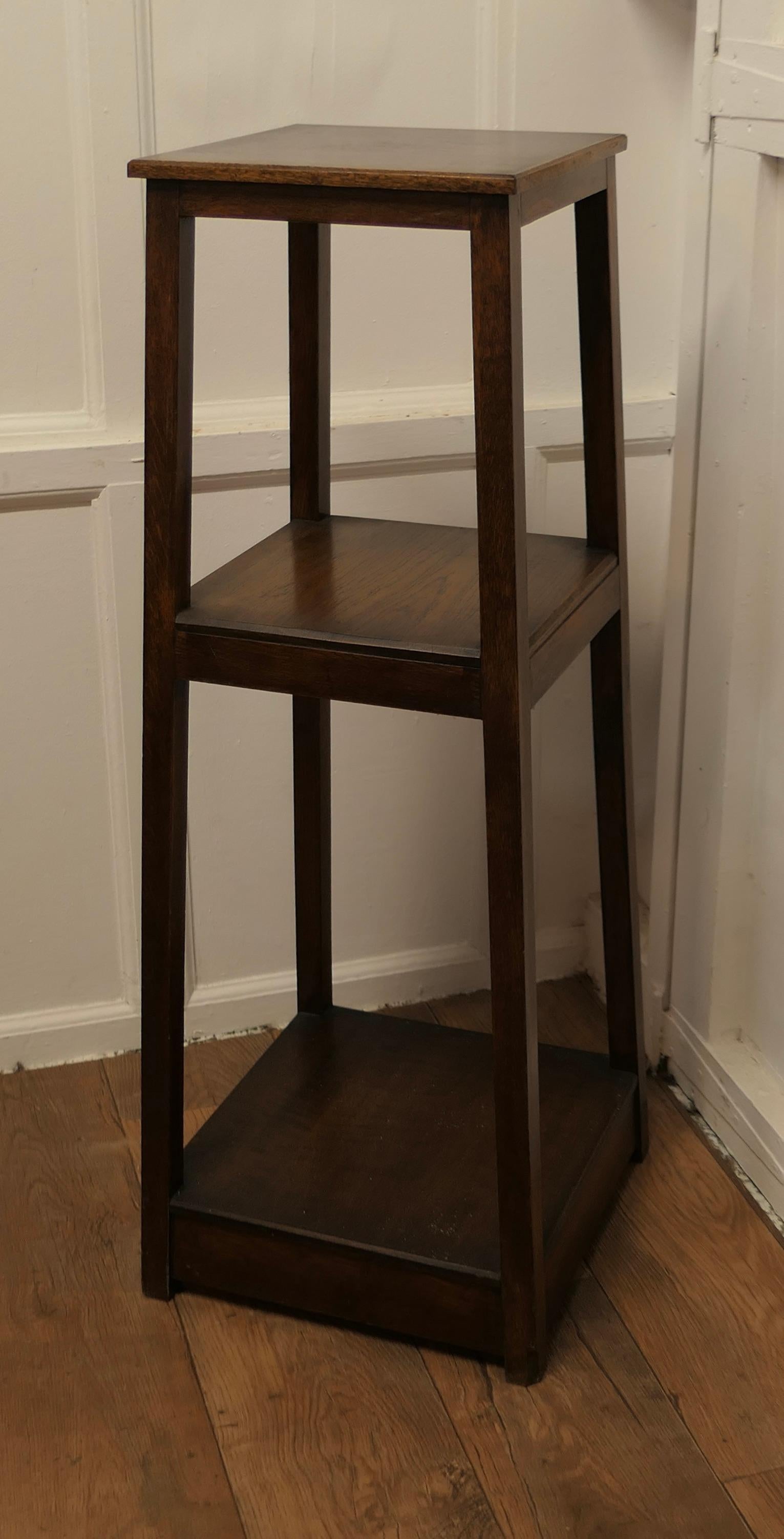 Oak Etagere or Plant Stand

This is a very useful piece, it is rectangular and  wider at the floor, it has 3 tiers and good clean lines
The etagere is 42” high, and 16” square at the floor
TSW173