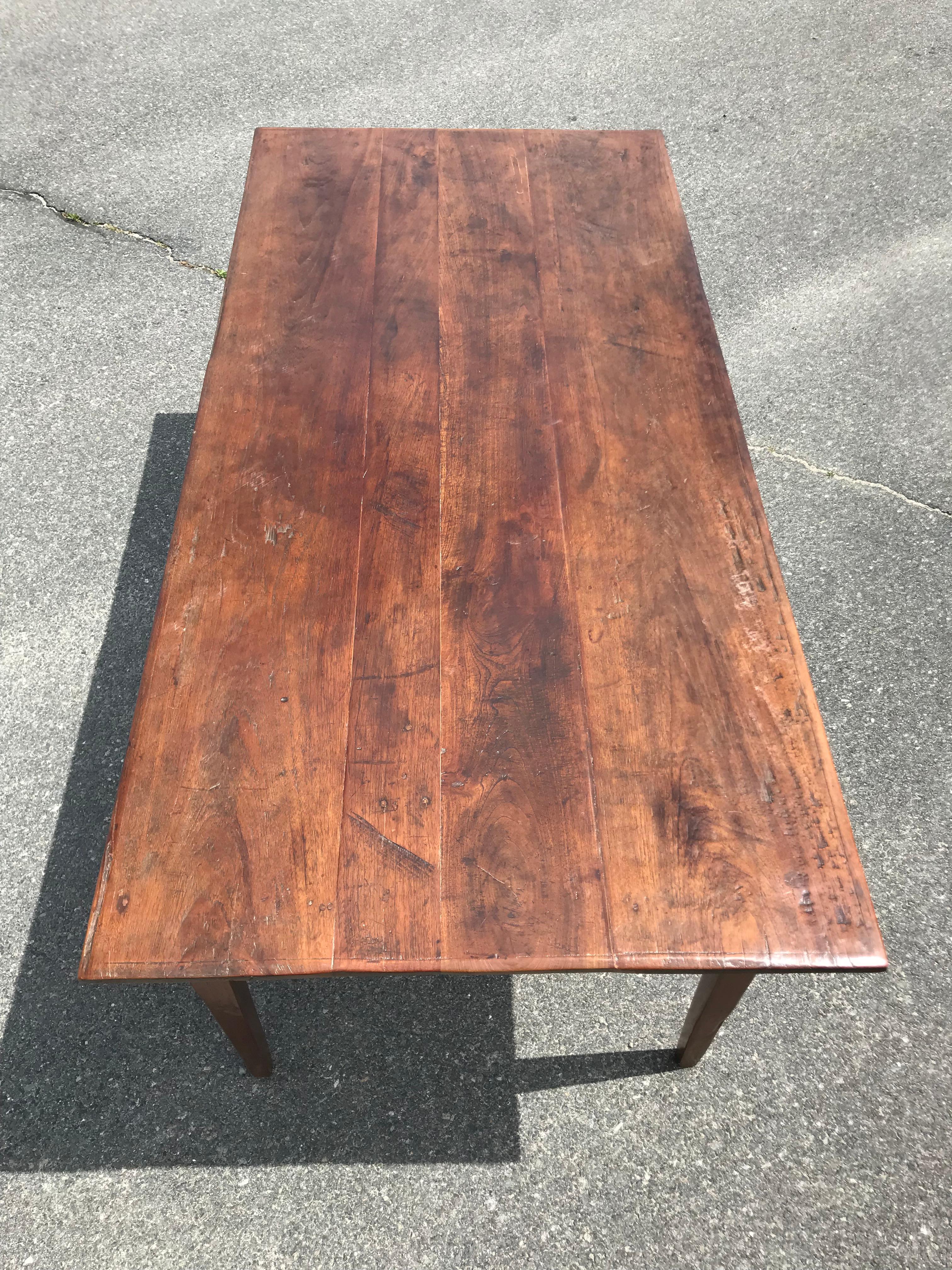 Oak farm table.
Top with old boards and interesting edge detail.