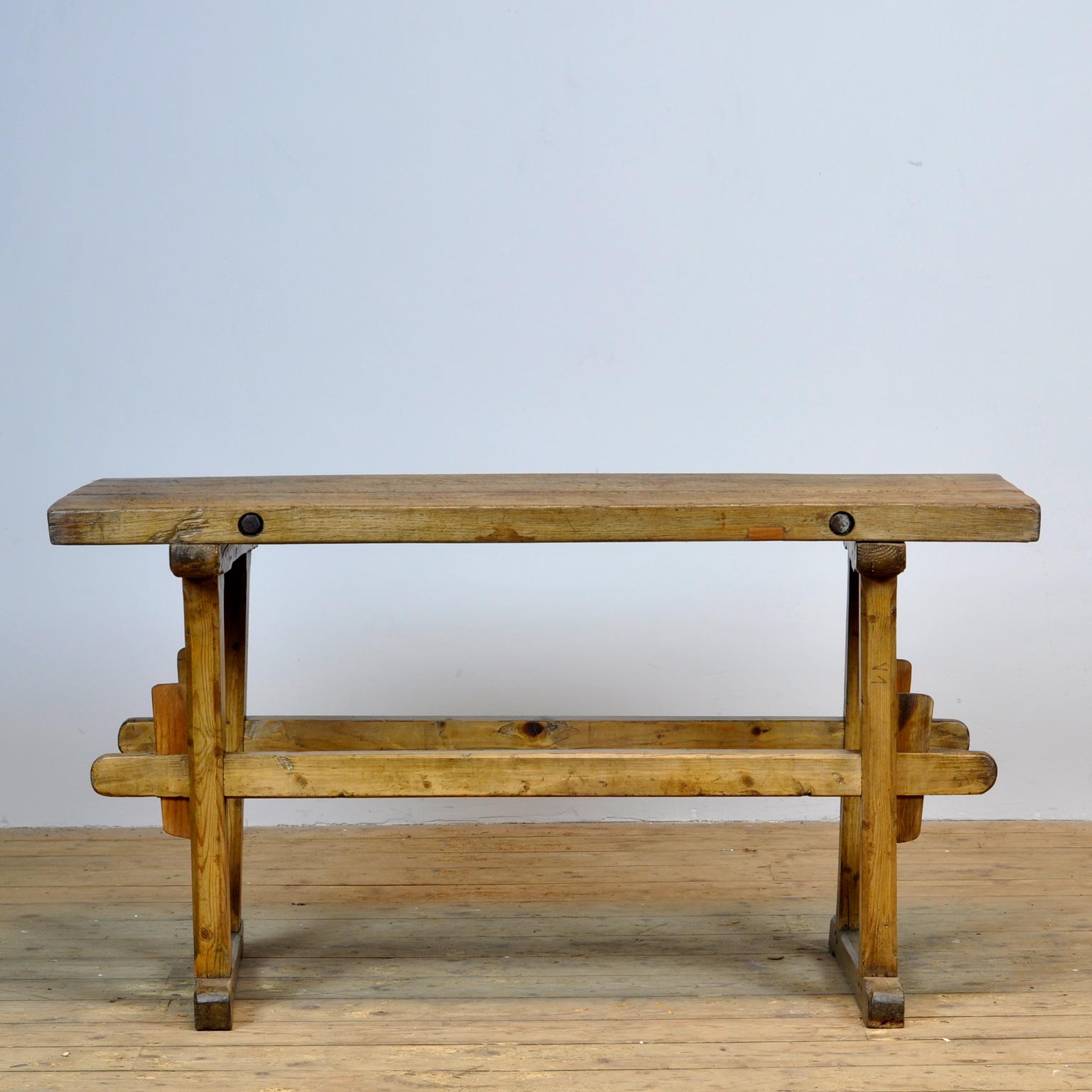 Oak farmers worktable with a nice distressed top of 6 cm thick. The top is strengthened with 2 iron bars.