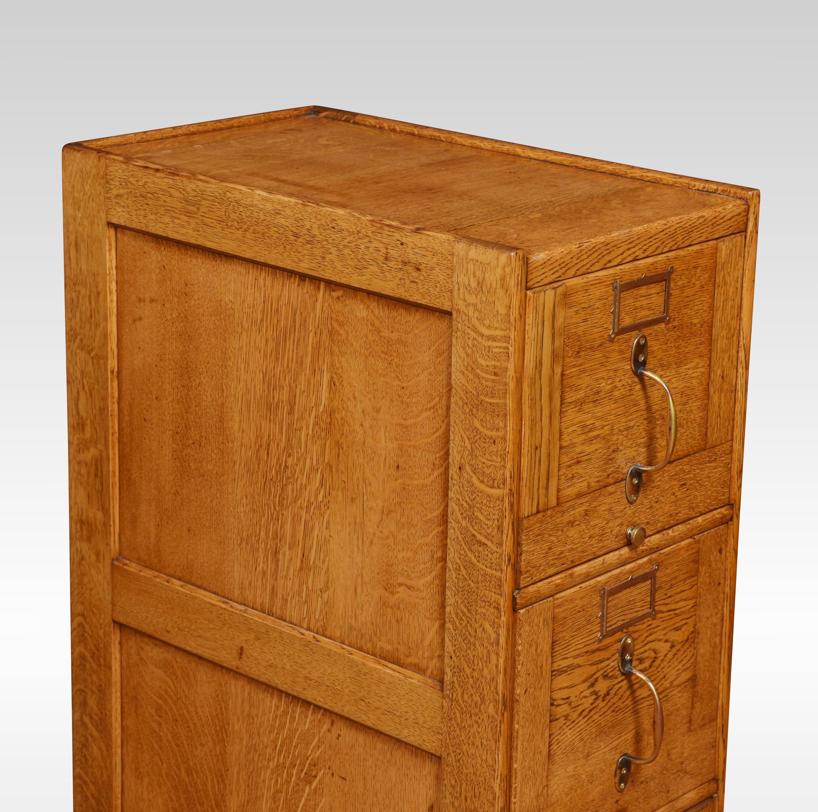 Oak filing cabinet, having a rectangular top, above three larger drawers, all drawers run freely and have nameplates. All raised up on plinth base.
Dimensions
Height 40 inches
Width 14.5 inches
Depth 24 inches.