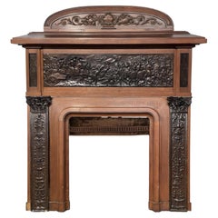 Oak Fireplace with Plaster Bas-Reliefs in Faux Bronze, dated 1896