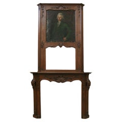 Oak fireplace with portrait of a gentleman