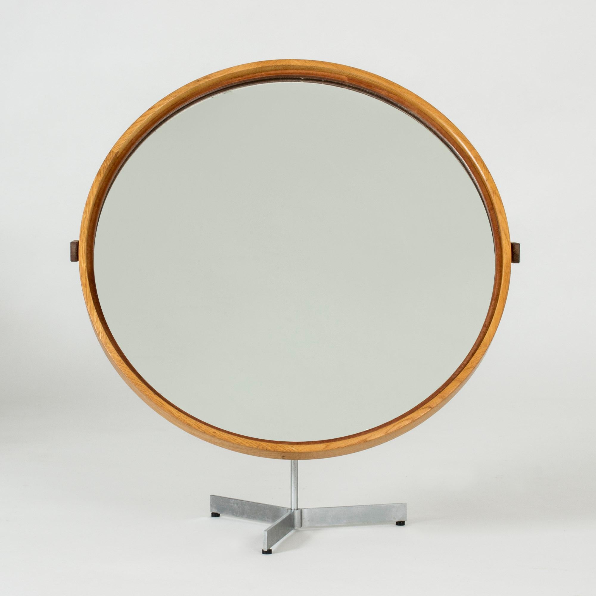 Amazing table mirror by Uno & Östen Kristiansson, made with a smooth, elegantly joined oak frame and a strict steel base.