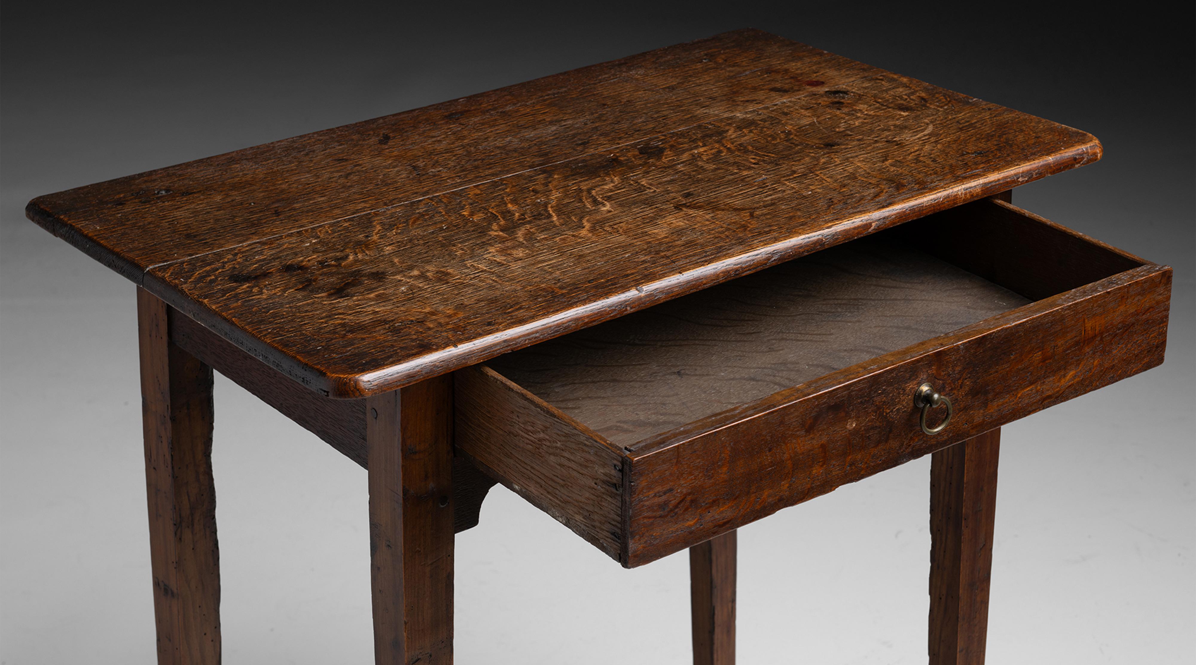 Oak & Fruitwood Side Table

England circa 1900

Finished side table with single drawer and ball feet.

26.75”L x 15.5”d x 27.75”h