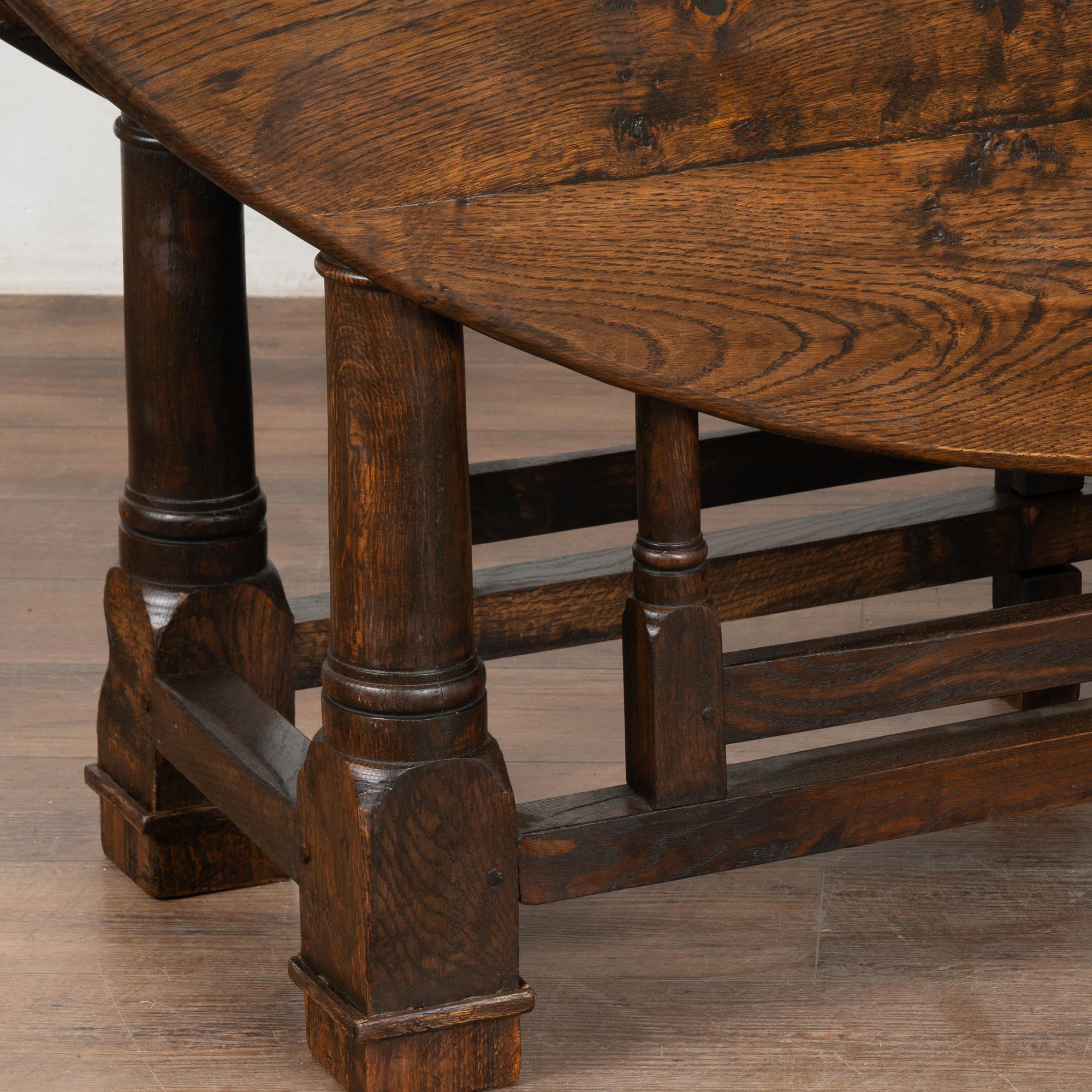 English Oak Gate Leg Drop Leaf Wake Dining Table, England circa 1880-1900 For Sale