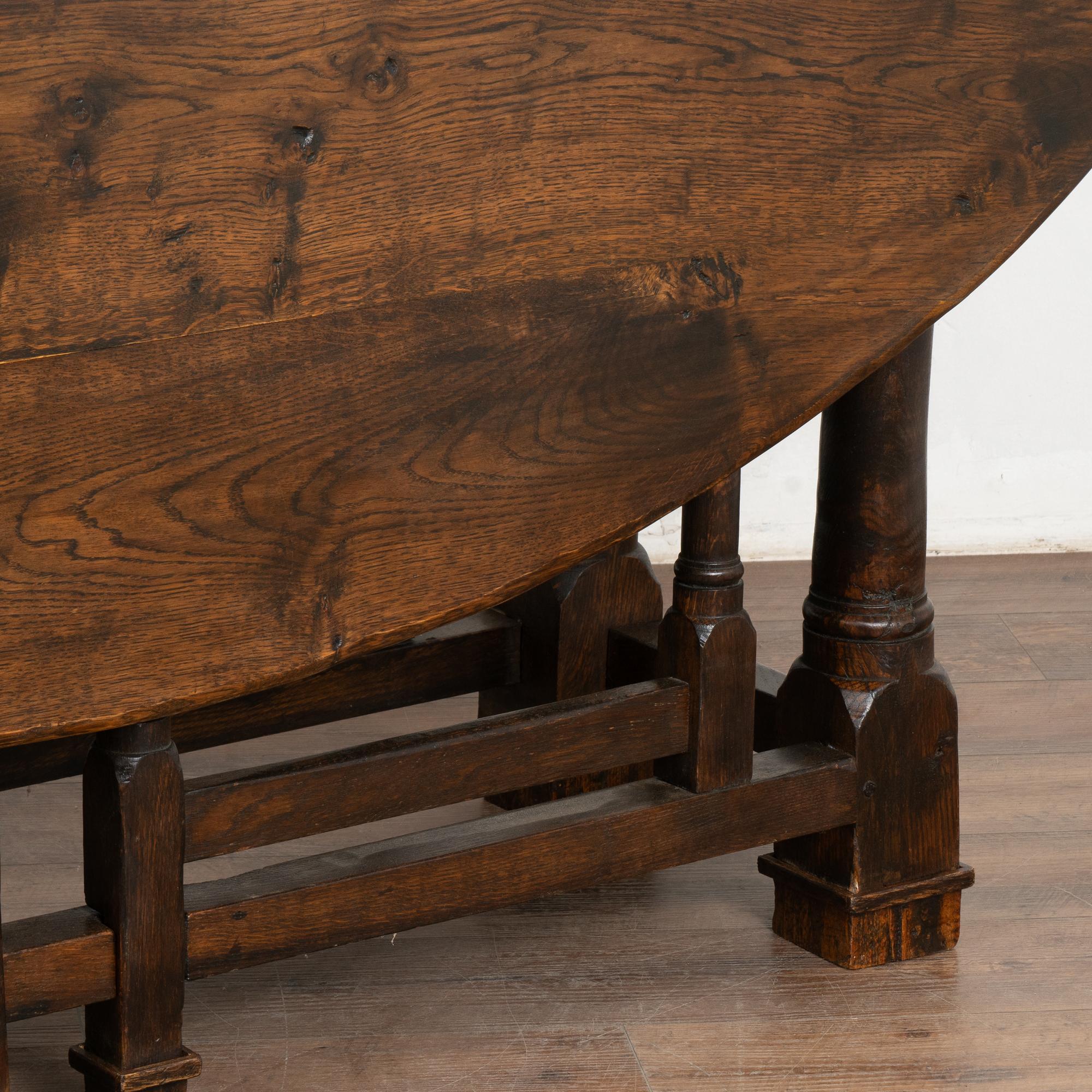 19th Century Oak Gate Leg Drop Leaf Wake Dining Table, England circa 1880-1900 For Sale