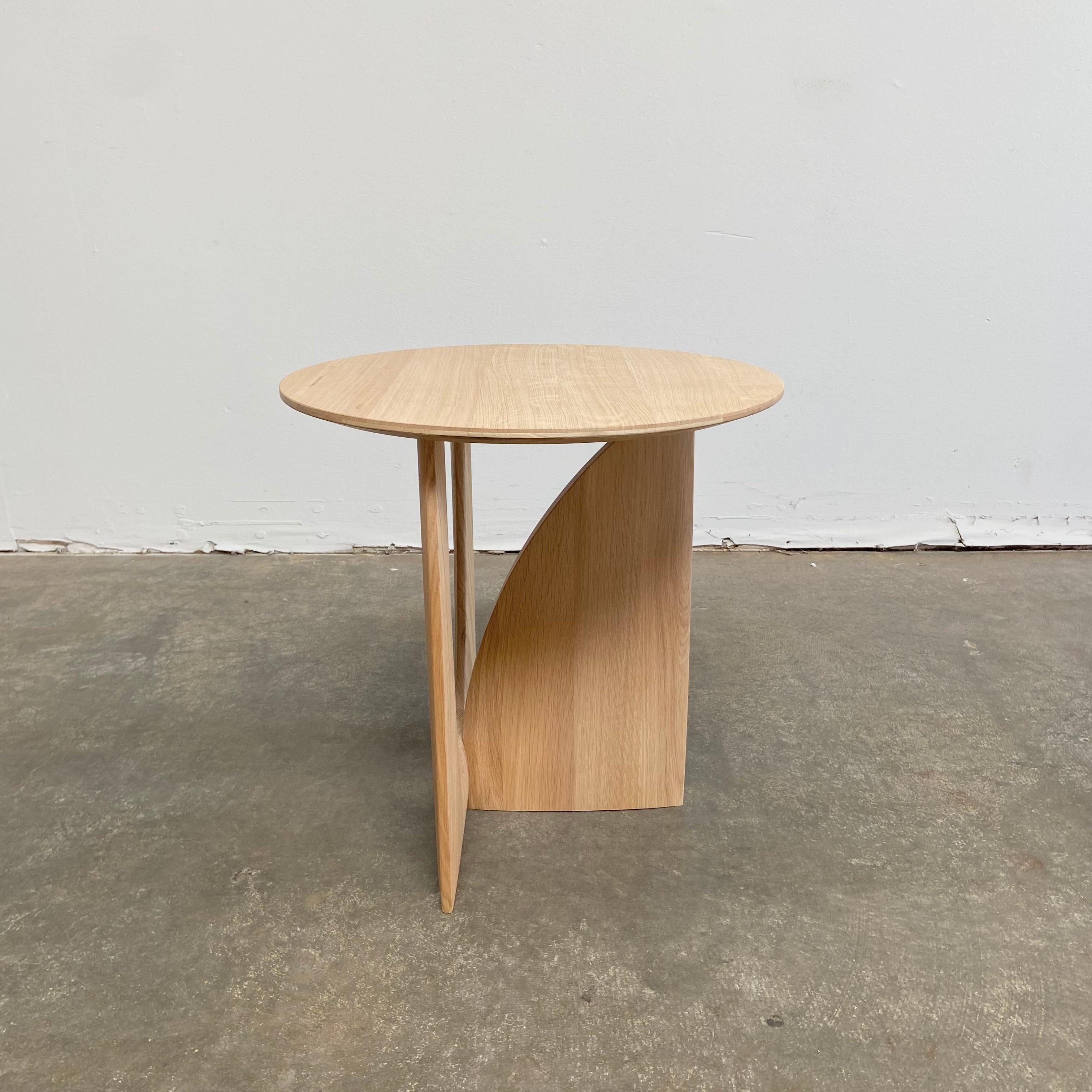 Tables / side tables

Oak geometric side table
By intersecting geometrical shapes and creating interaction, designer Alain van Havre found something new. From any angle, the side table does not only look different, it also becomes