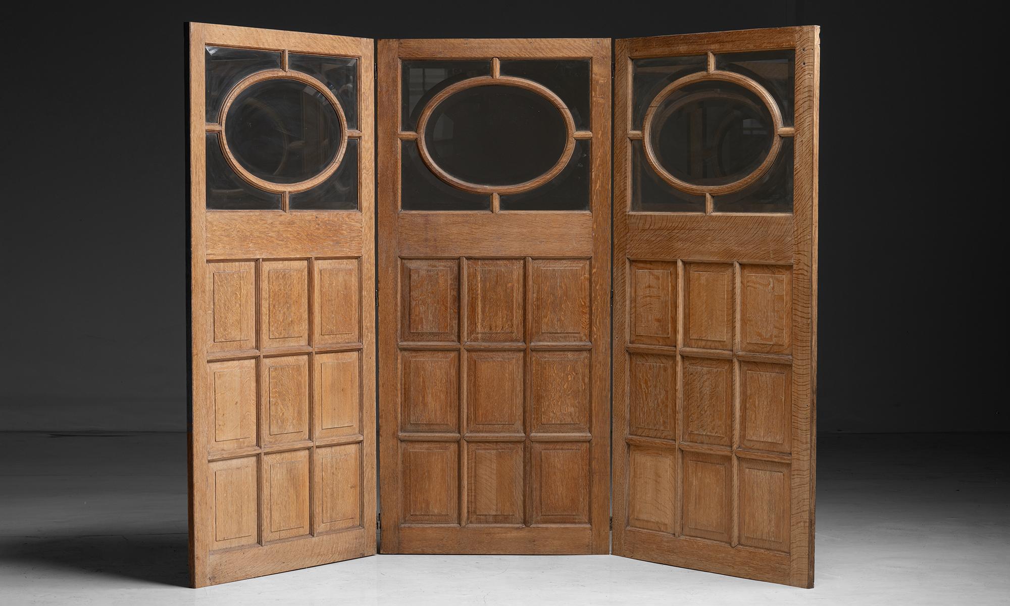 Oak & Glass Room Divider

England circa 1890

Paneled oak doors with beveled glass and brass hardware.

99