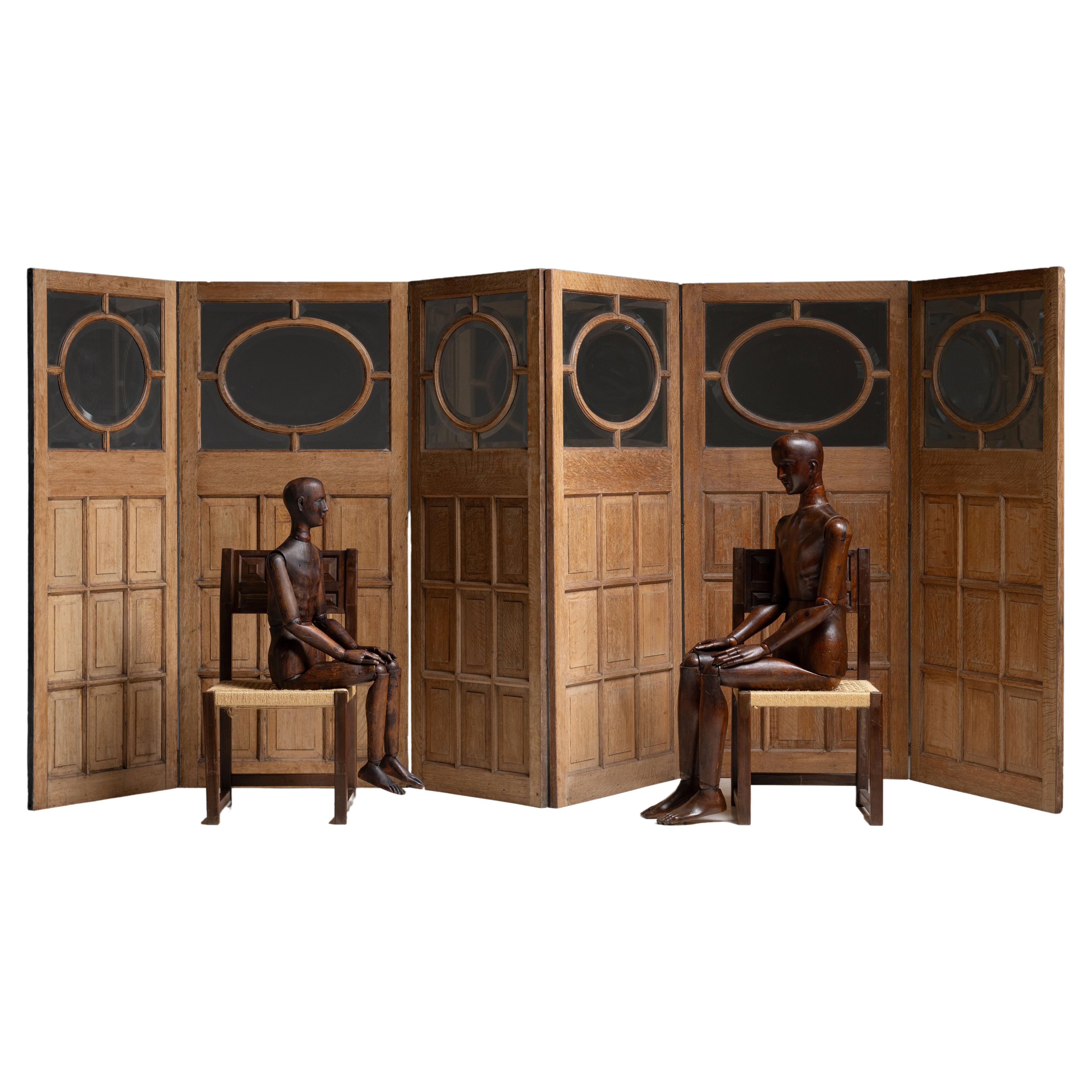 Oak & Glass Room Dividers

England circa 1890

Paneled oak doors with beveled glass and brass hardware.

84.5