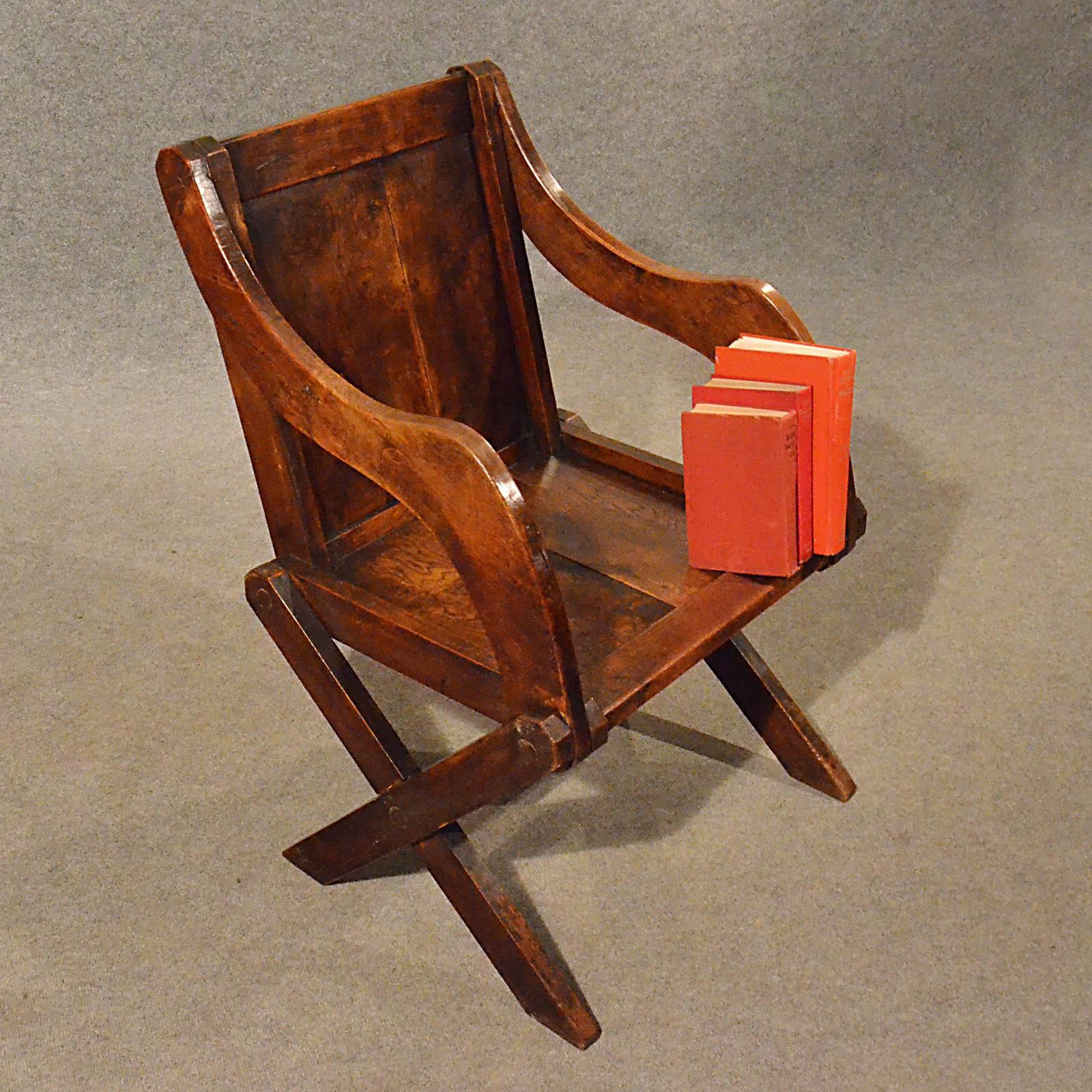 A superior antique chair presented in very good condition
Of classic 'Glastonbury' form
In oak showing charming grain with fine colour
Traditionally crafted with pegged jointing
Desirable design offering comfortable seating
Rising from X-form