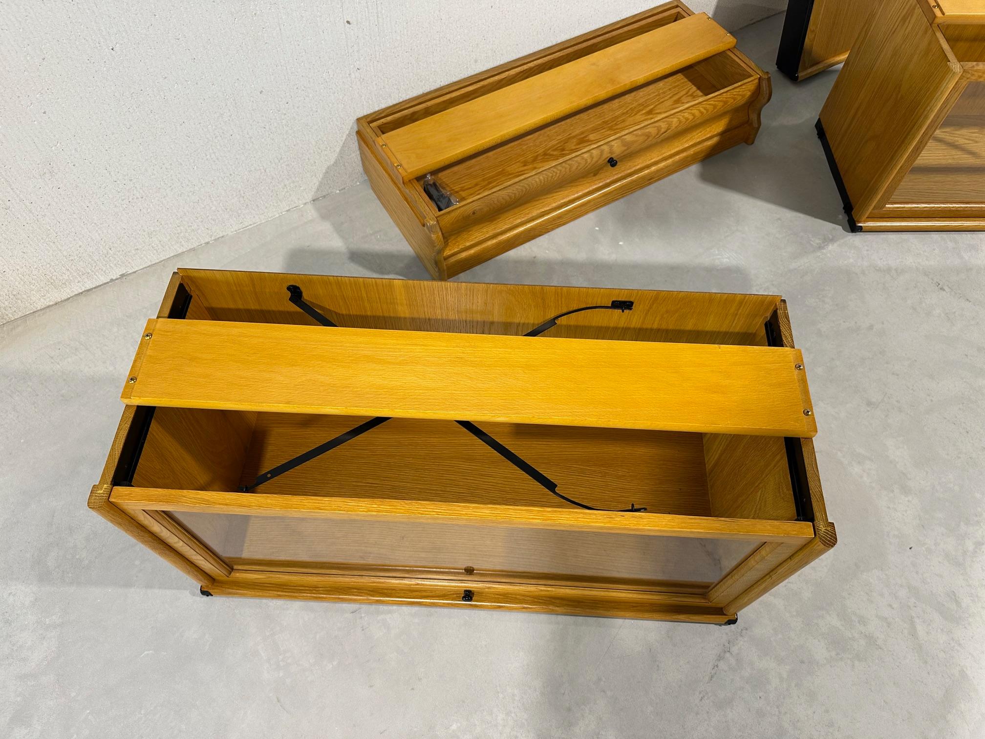 New solid oak Globe Wernicke stackable bookcase.
The back and base are not solid, as is always the case with Globe Wernicke bookcases. Arranged in a row of 6 sections with a plinth and top. The plinth has a drawer.
Available from stock in any