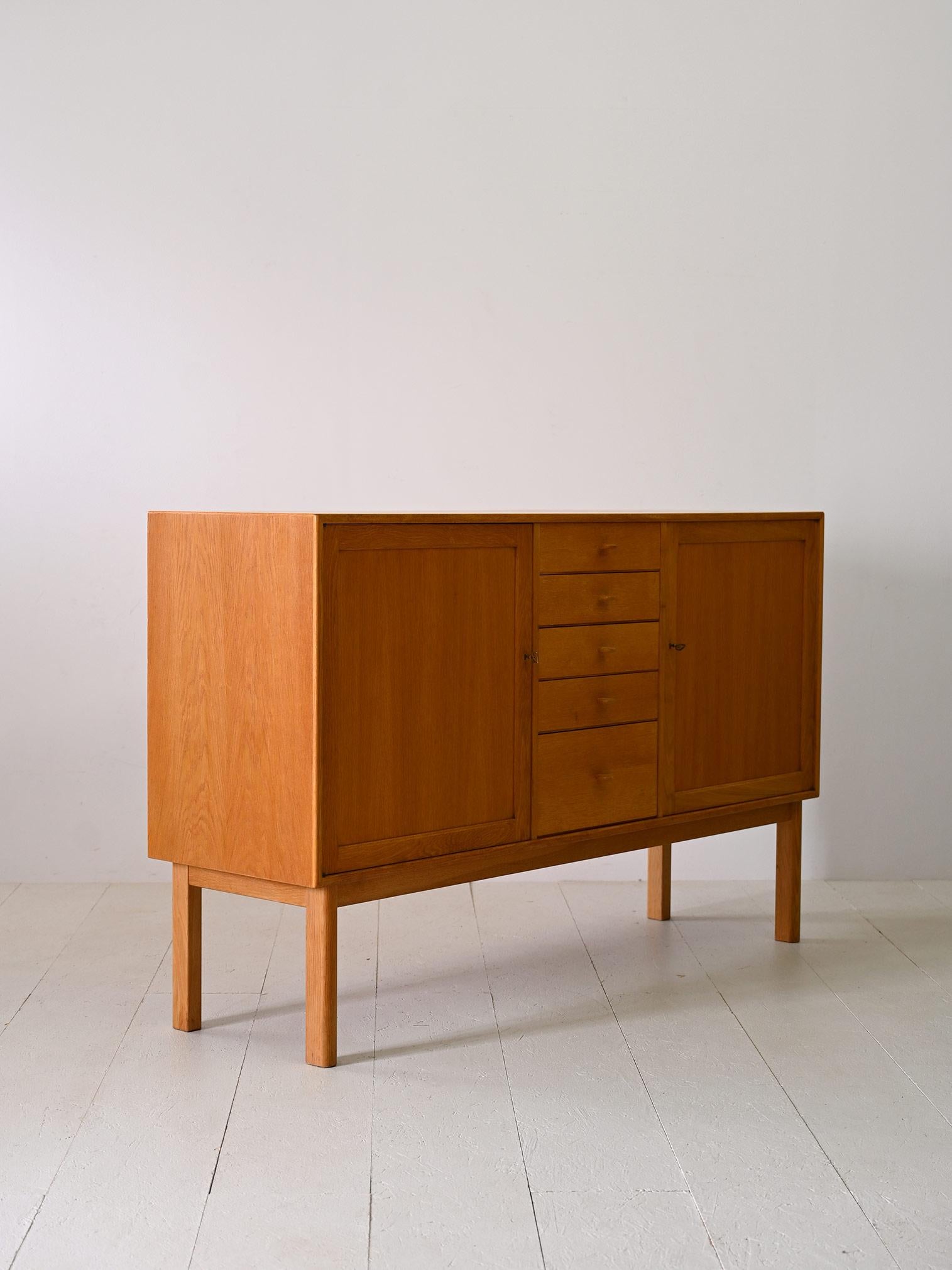 Swedish Oak highboard with center drawers For Sale