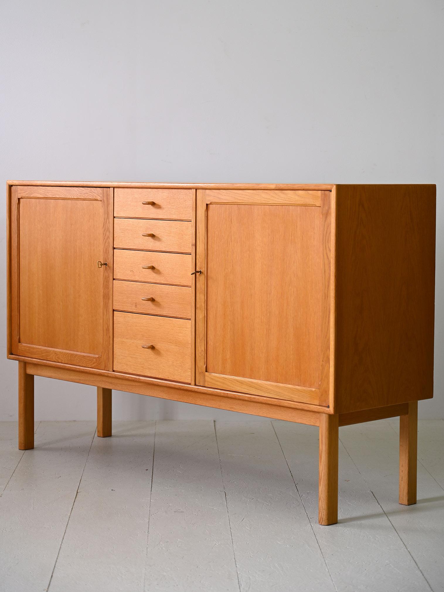 Mid-20th Century Oak highboard with center drawers For Sale