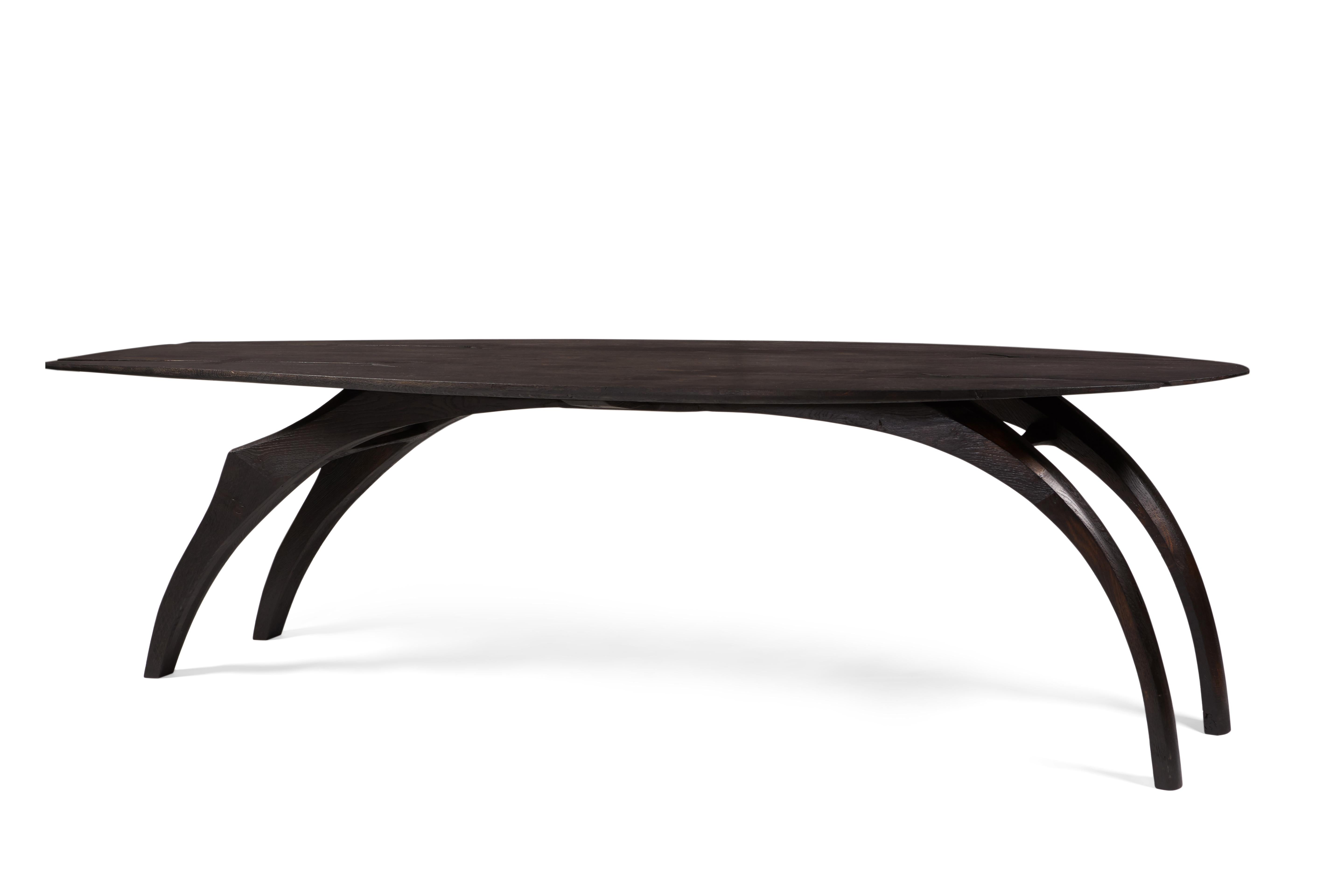 'Leap' table by Jonathan Field. Scorched legs & ebonized top.  2