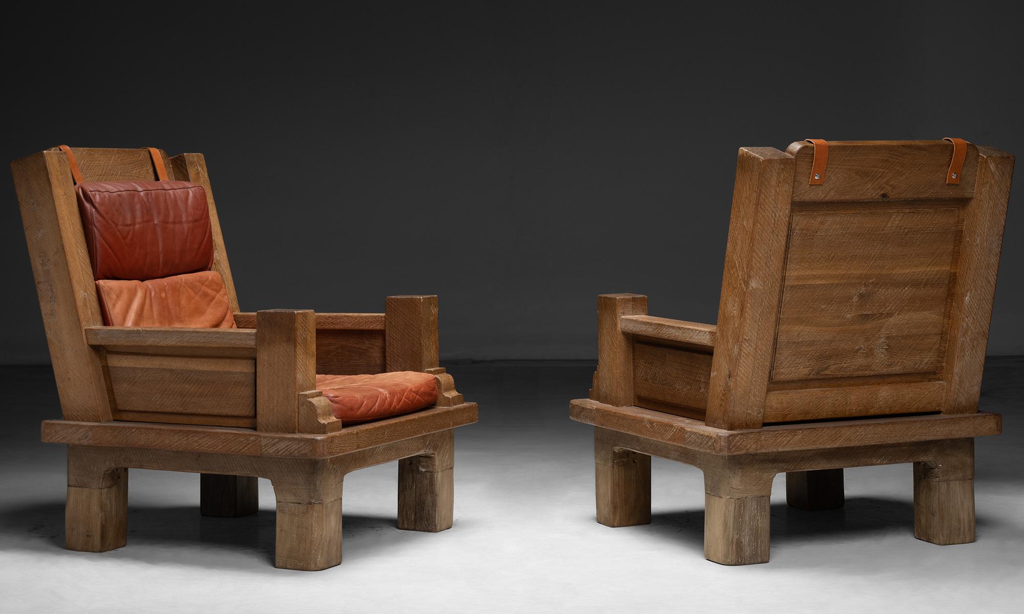 Oak & Leather Armchairs
France, 1970
Large Scale chairs, Worn leather cushions on solid oak trestle-style frames.
30”w x 37”d x 41”h x 14” seat