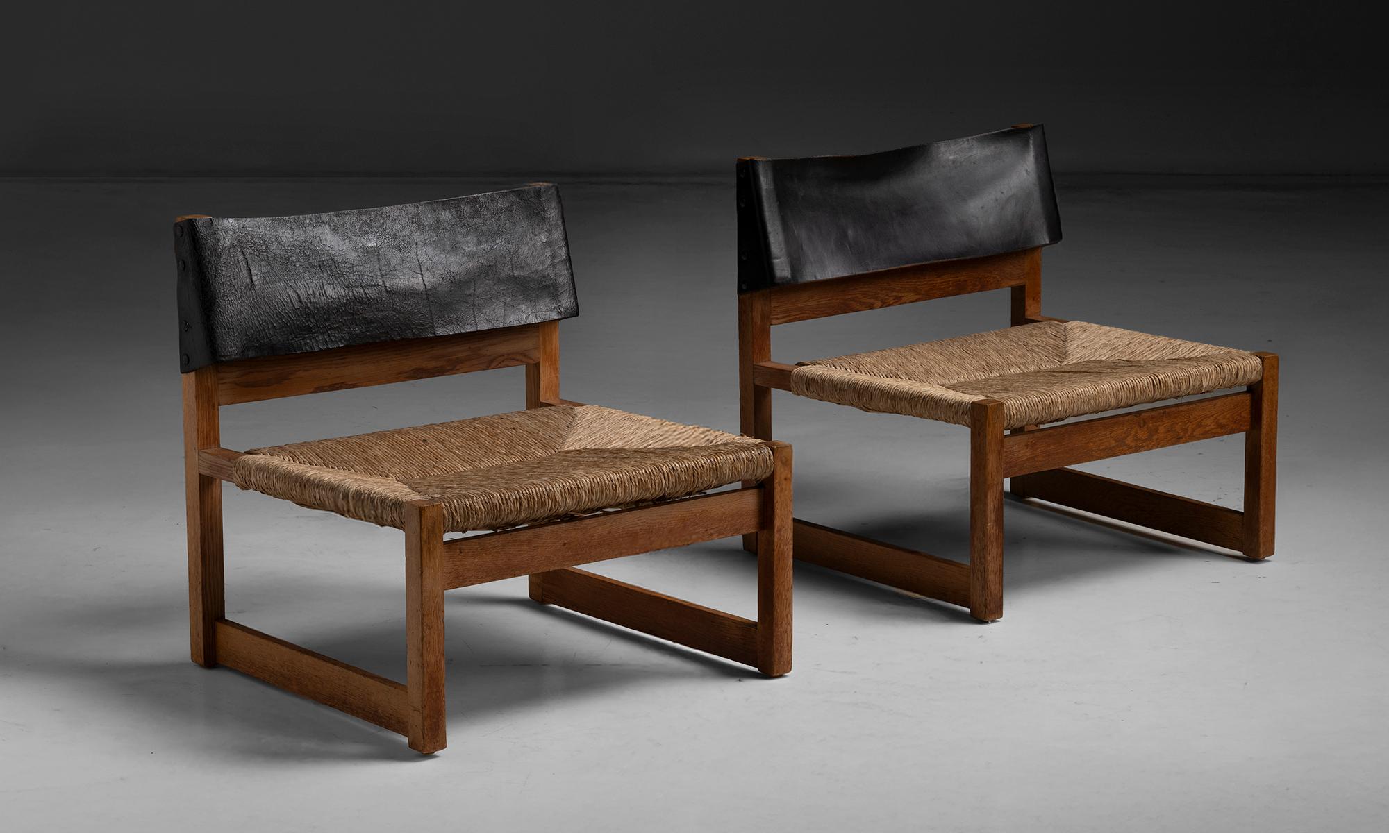 Spain, 1963
Oak frame with original leather backrest and rush seats.
24
