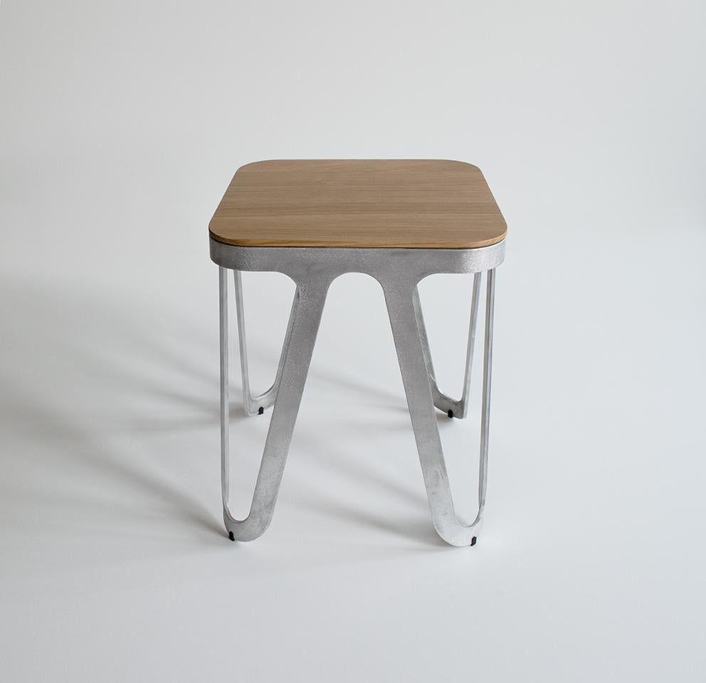 Oak loop stool by Sebastian Scherer
Dimensions: D38 x W38 x H45 cm
Material: Aluminium, solid wood, oak
Weight: 4.2 kg
Also available in aluminium, loop stool wood: Solid wood (matt lacquered): black and white stained ash / natural oak /