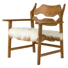 Oak Lounge Chair by Henning Kjærnulf