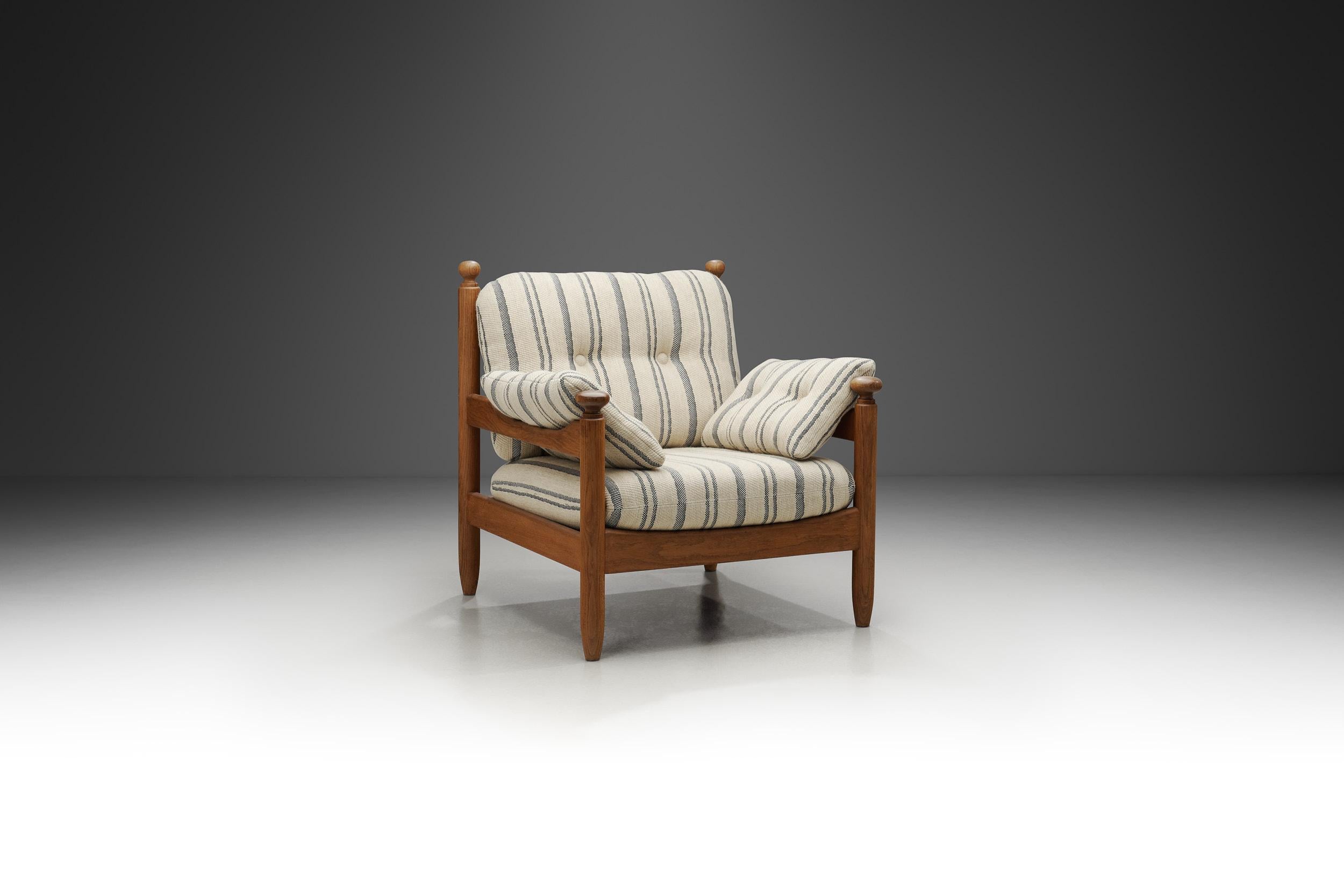 This 1960s oak lounge chair, originating from the Netherlands, mirrors typical Dutch mid-century furniture - embodying simplicity and functionality. Mid-century modern furniture was mainly designed with the urban home in mind, and Dutch furniture