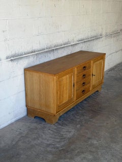Buffet bas en chêne avec quatre tiroirs et deux portes, vintage danois des années 1970