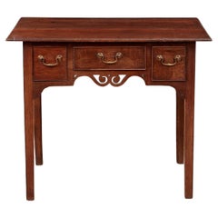 Lowboy in Oak con grembiule aperto a volute