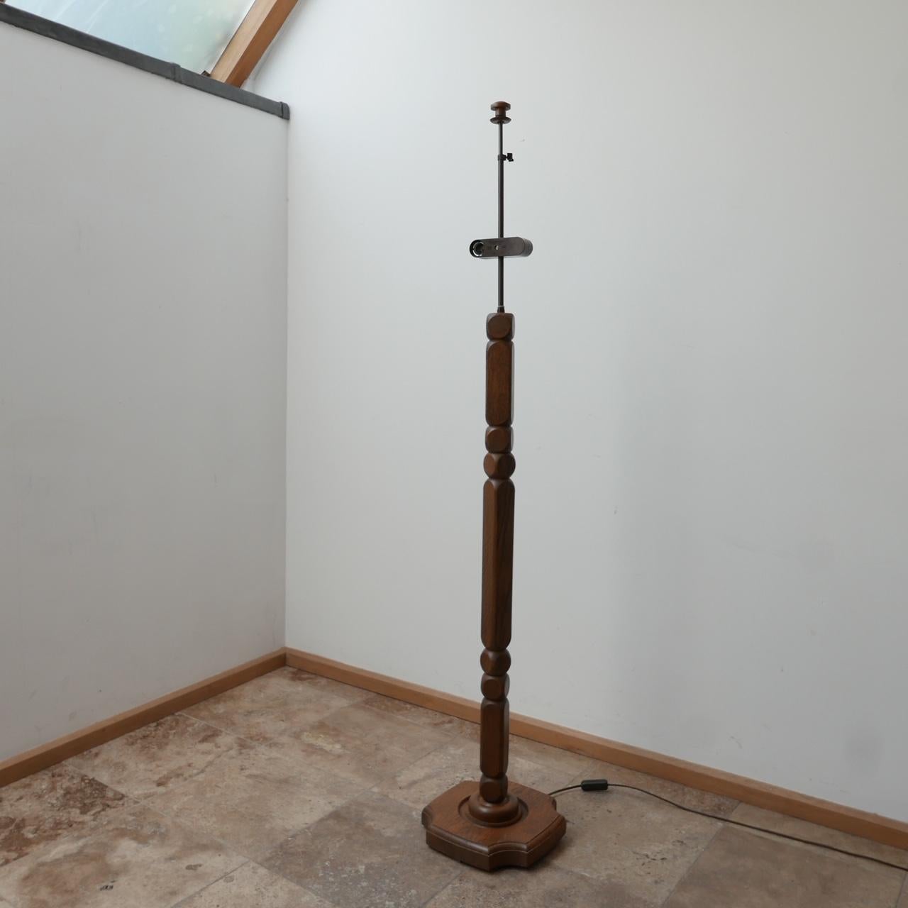 A turned oak floor lamp of geometric forms. 

Belgium, c1960s. 

Good condition. 

Re-wired and PAT tested. 

Dimensions: 170 H x 31 W x 31 D in cm. 

Delivery: POA.

