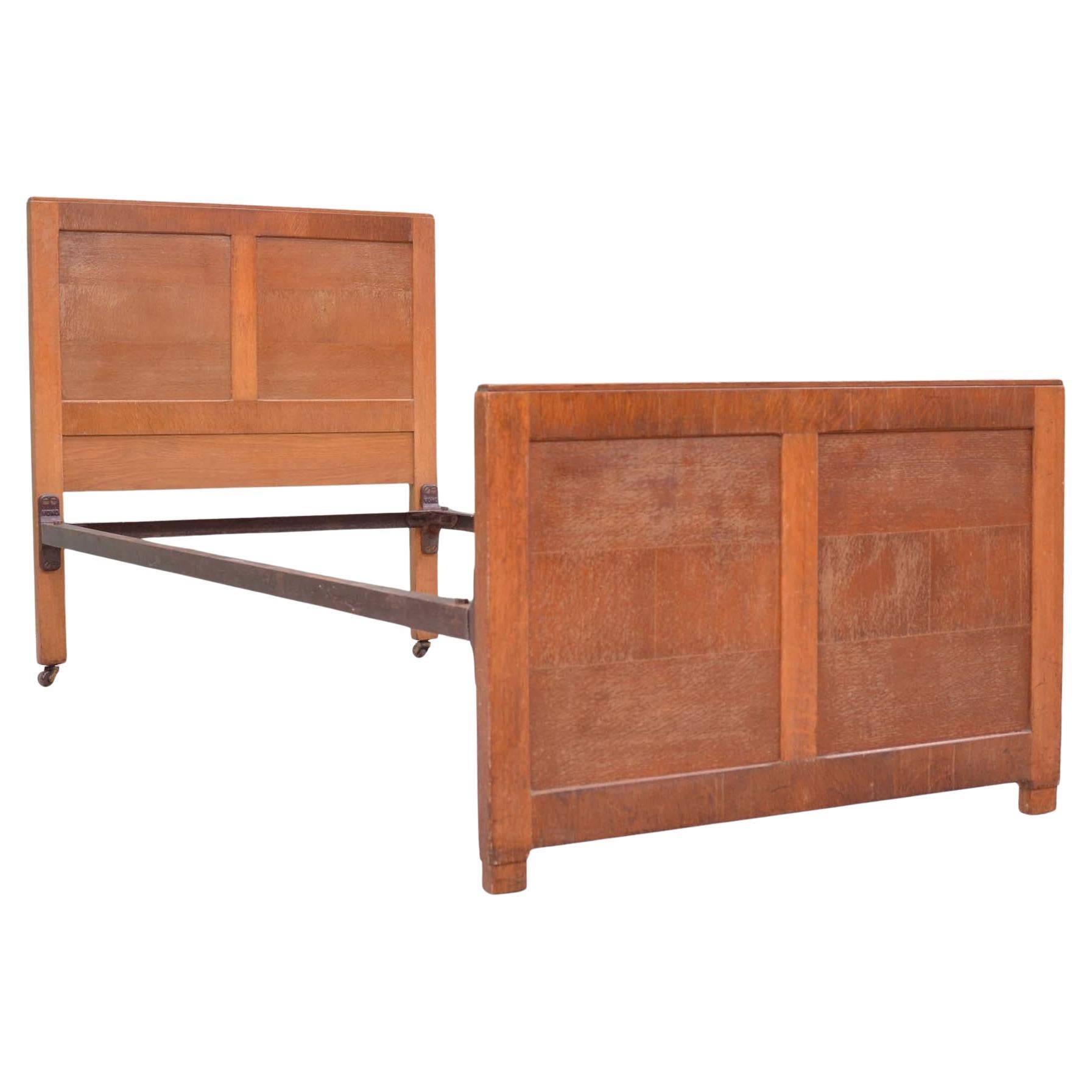 Oak mid century single bed in the manner of Heals For Sale