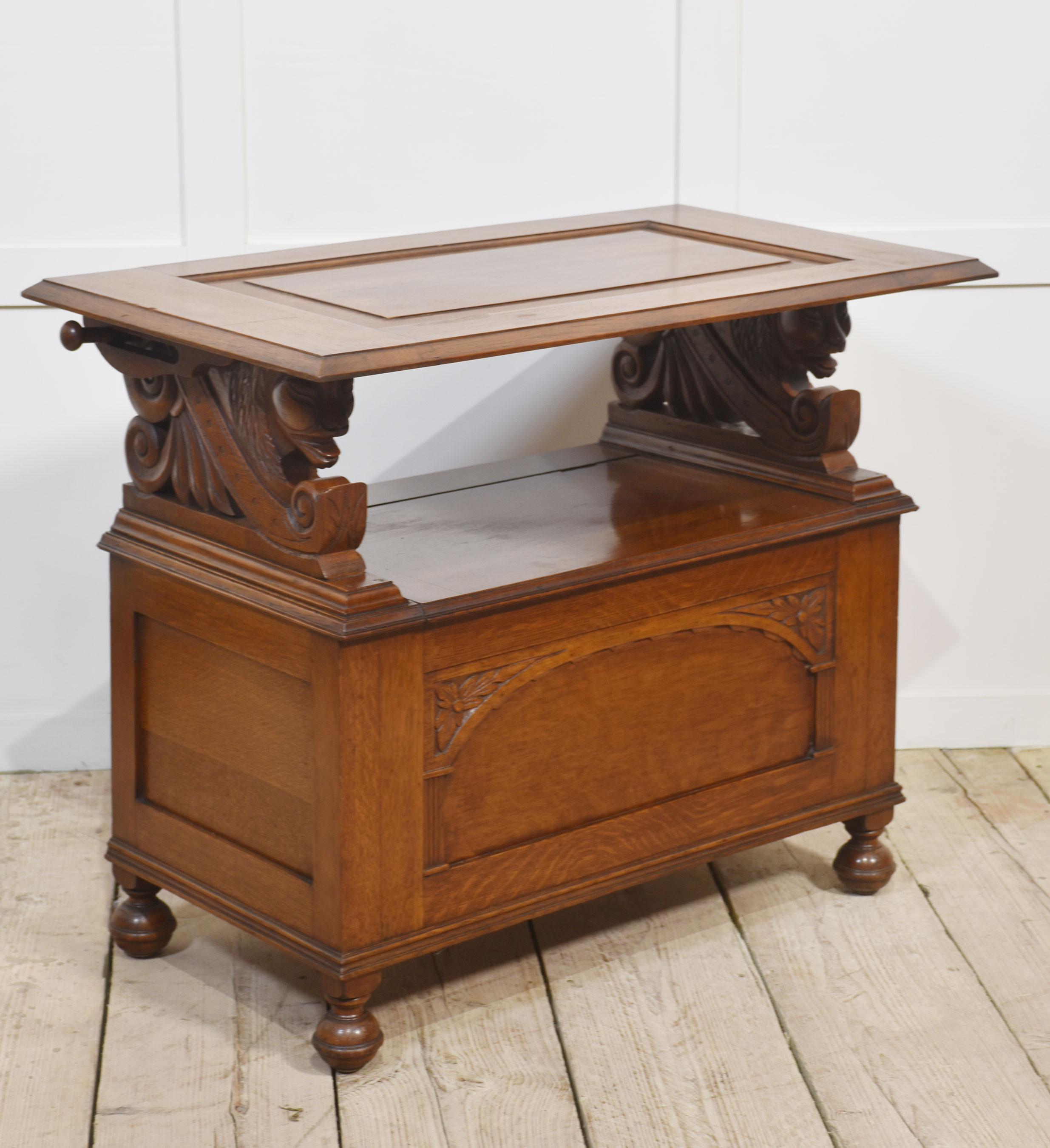 Oak monks bench of narrow proportions, the rectangular hinged floral carved back, above a box base with hinged lid flanked by a lion armrests. All raised up on bun feet.
Dimensions
Height 39 Inches height to seat 18 Inches
Width 36 Inches
Depth 20