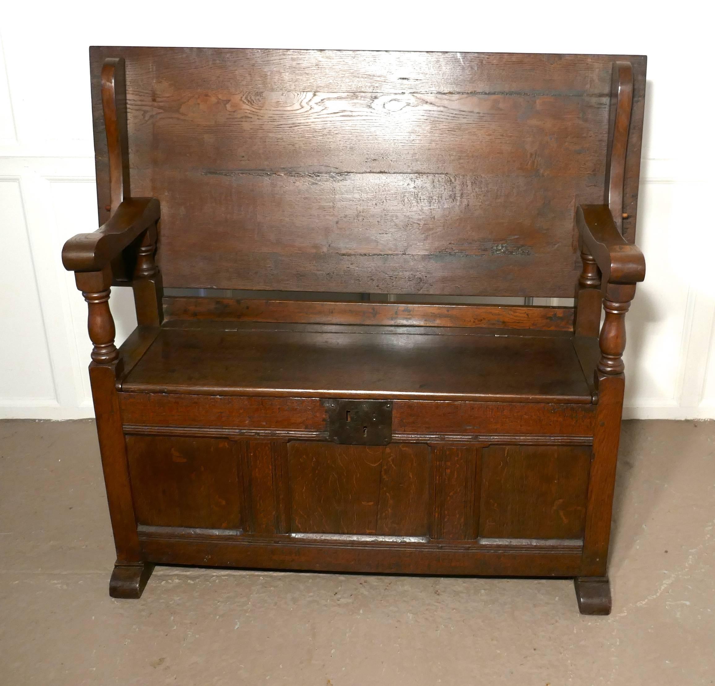 Oak Monks bench settle, hall table.


This unusual piece is known as a monks bench, it is fact a settle with storage compartment inside the seat and the back of the bench can be pulled over, it then rests on the on the top of the arms making a