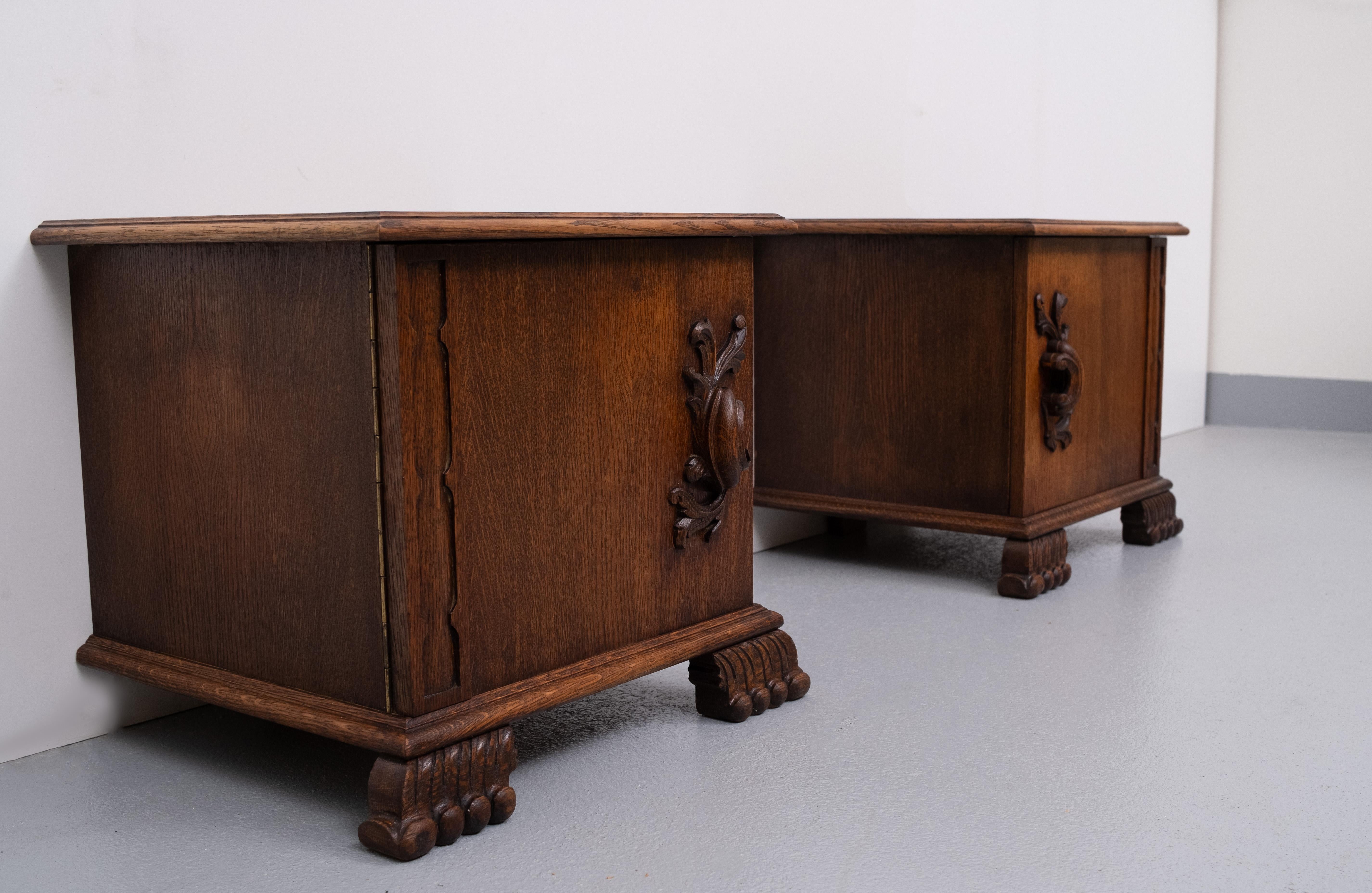 Two very nice hand carved oak night stands. 1940s Holland. Good condition.