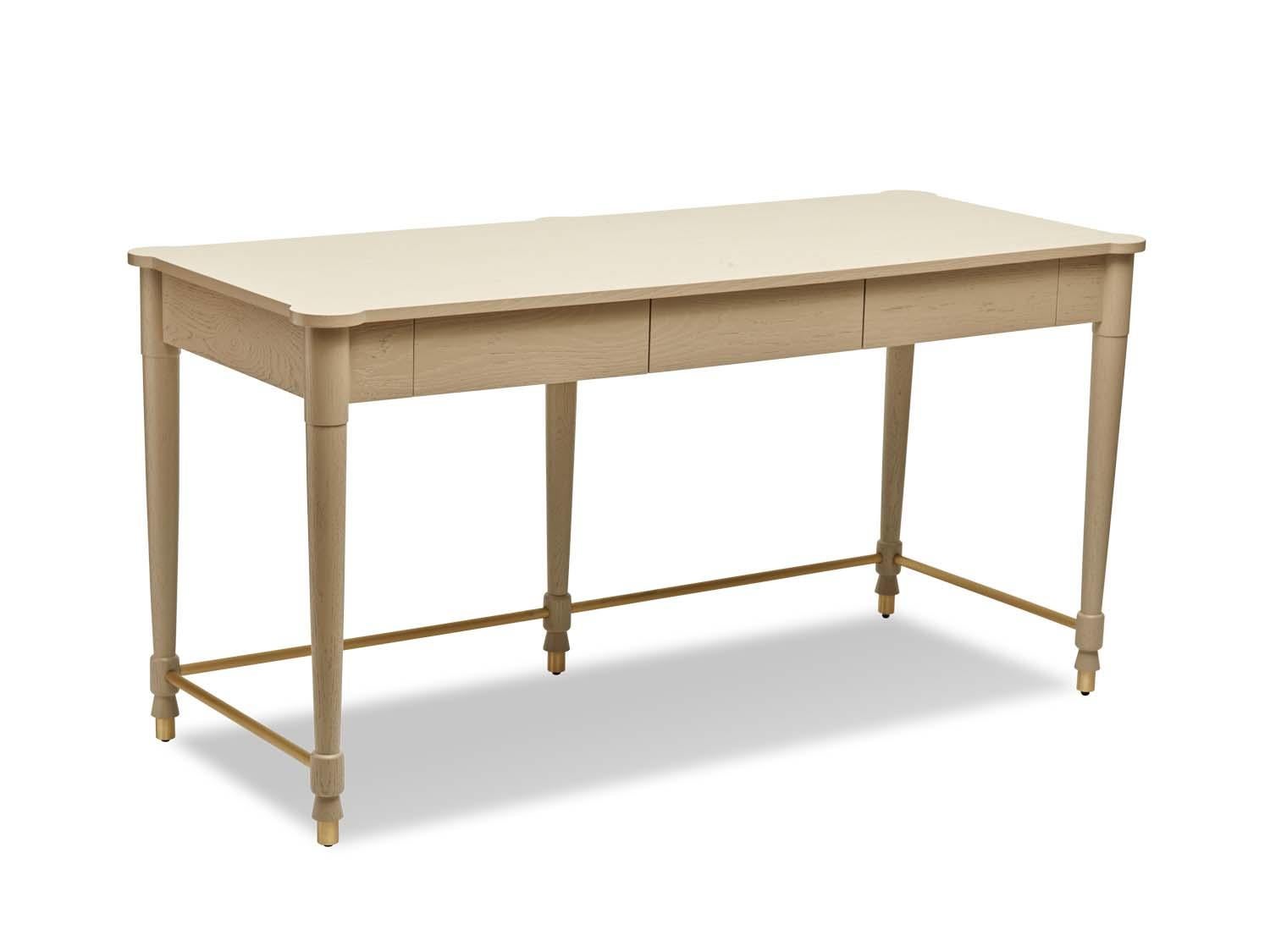 The Niguel desk features brass cap feet and a brass cross-stretcher with lacquered interior drawers. Shown here in in Rocky Beach pigmented oak

The Lawson-Fenning Collection is designed and handmade in Los Angeles, California.
 